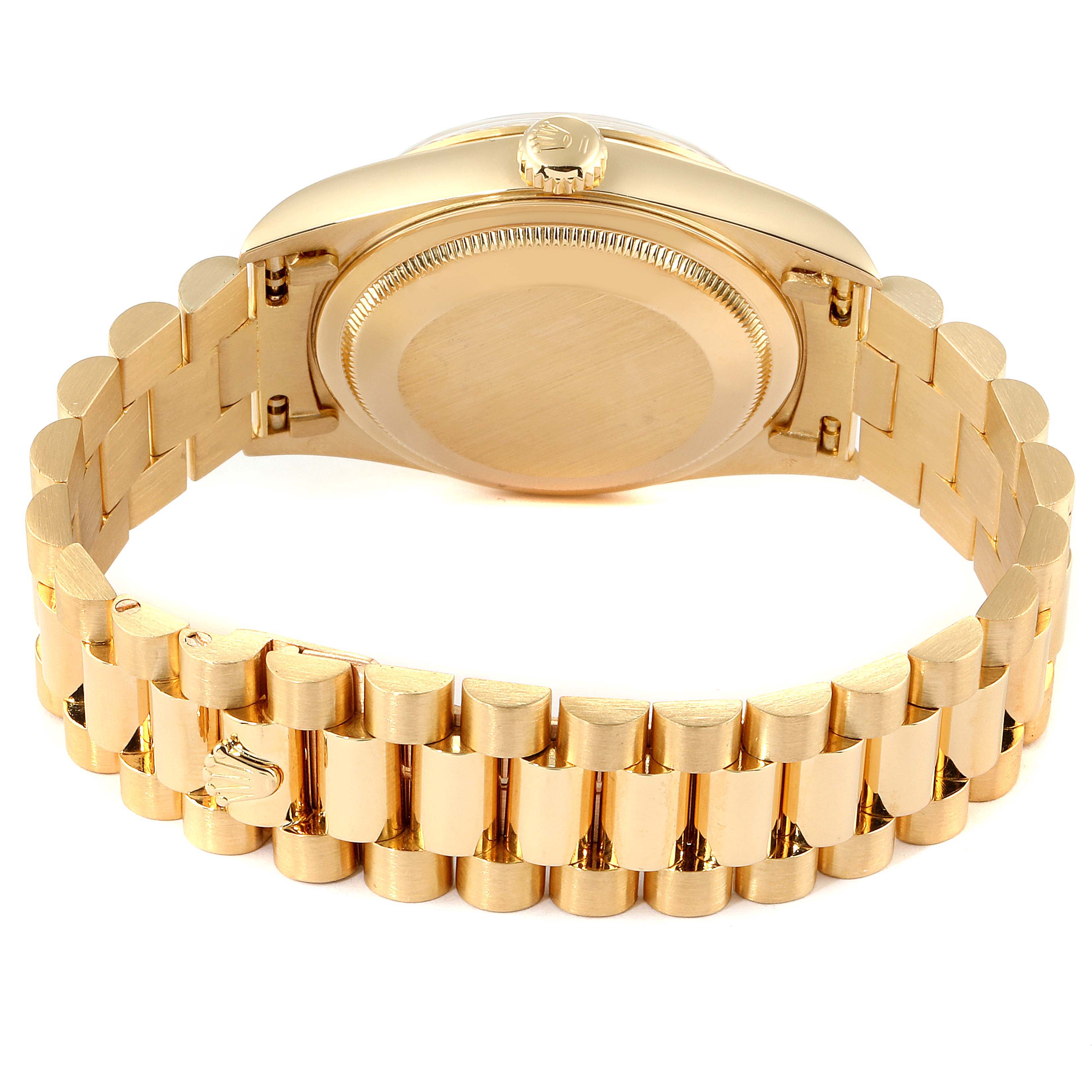 This image shows the underside and gold-toned bracelet of a Rolex President 18238 Men
s Yellow Gold Champagne Dial 18238 Men
s Yellow Gold Champagne Dial model watch.