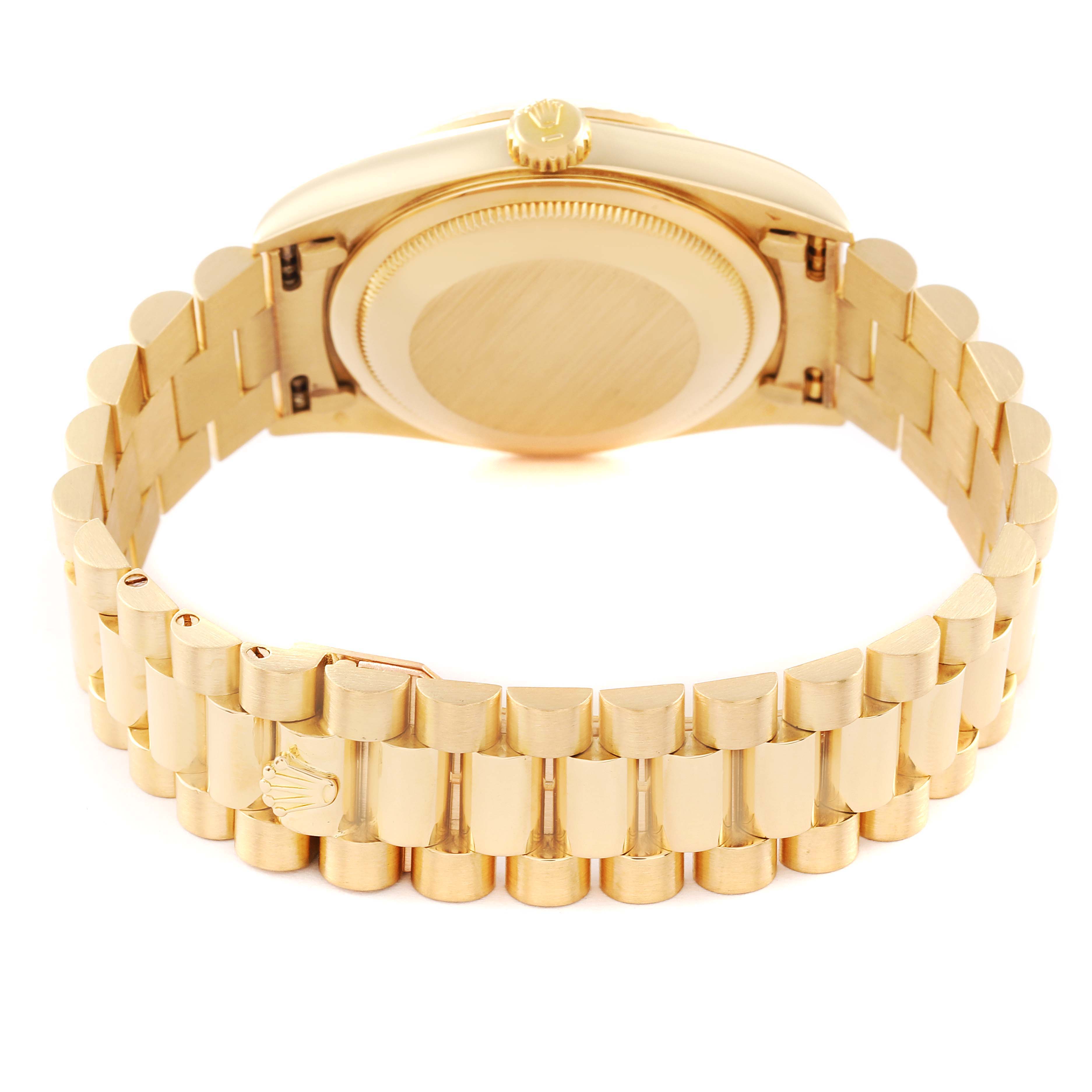 This image shows the backside and bracelet of a Rolex President 18238 Men's Yellow Gold Champagne Dial 18238 Men's Yellow Gold Champagne Dial model watch.