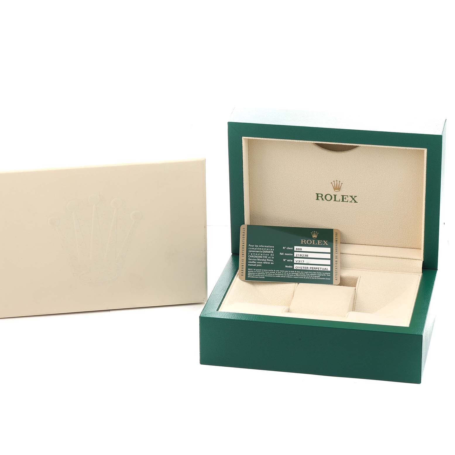 The image shows the open box of a Rolex President 218238 Men
s Yellow Gold Champagne Dial model, displaying the card and interior packaging.