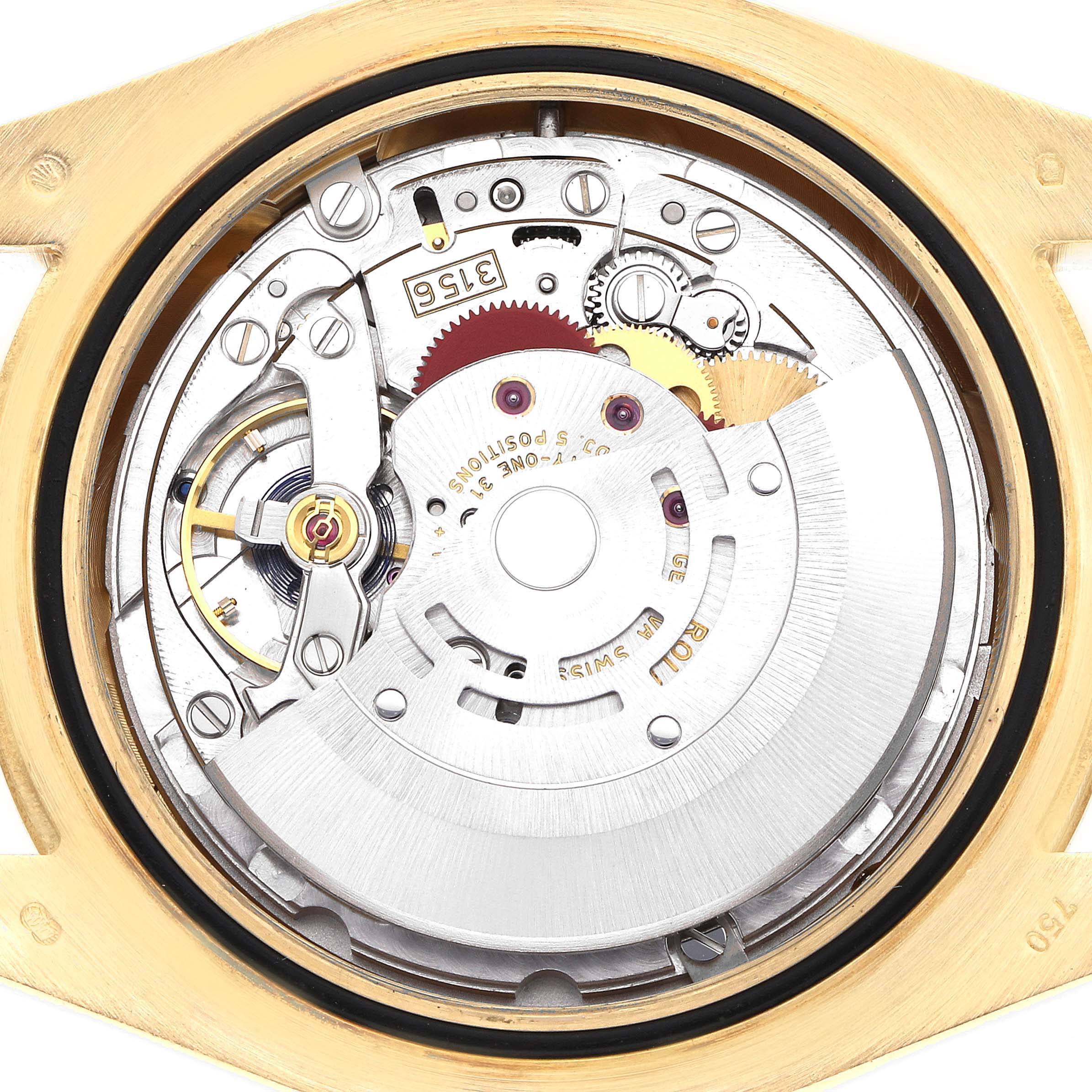 The image shows the movement of a Rolex President 218238 Men
s Yellow Gold Champagne Dial model watch from a top-down angle, highlighting the gears and rotor.