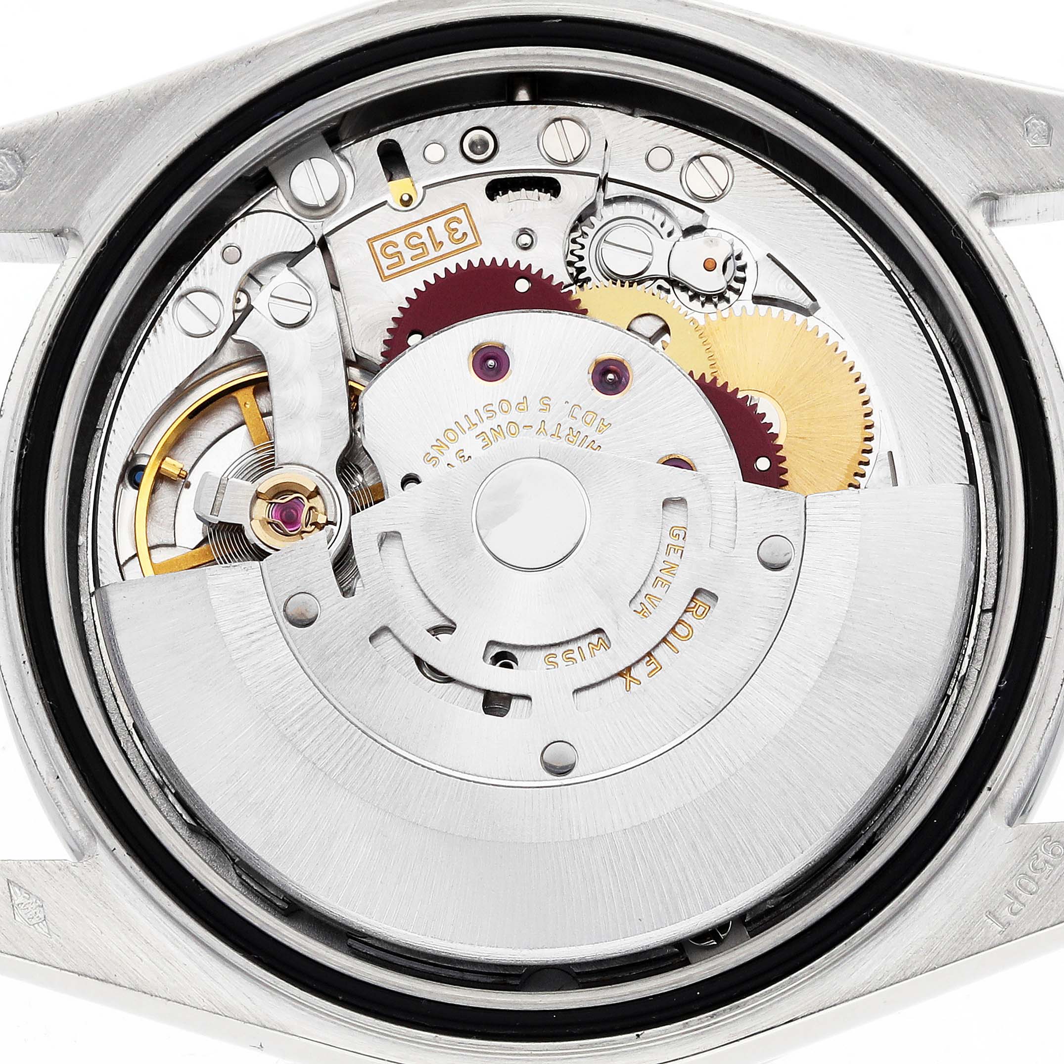 The image shows the movement of a Rolex President 118346 Men
s Platinum Silver Dial watch from a top-down angle, revealing gears, rotor, and other internal components.