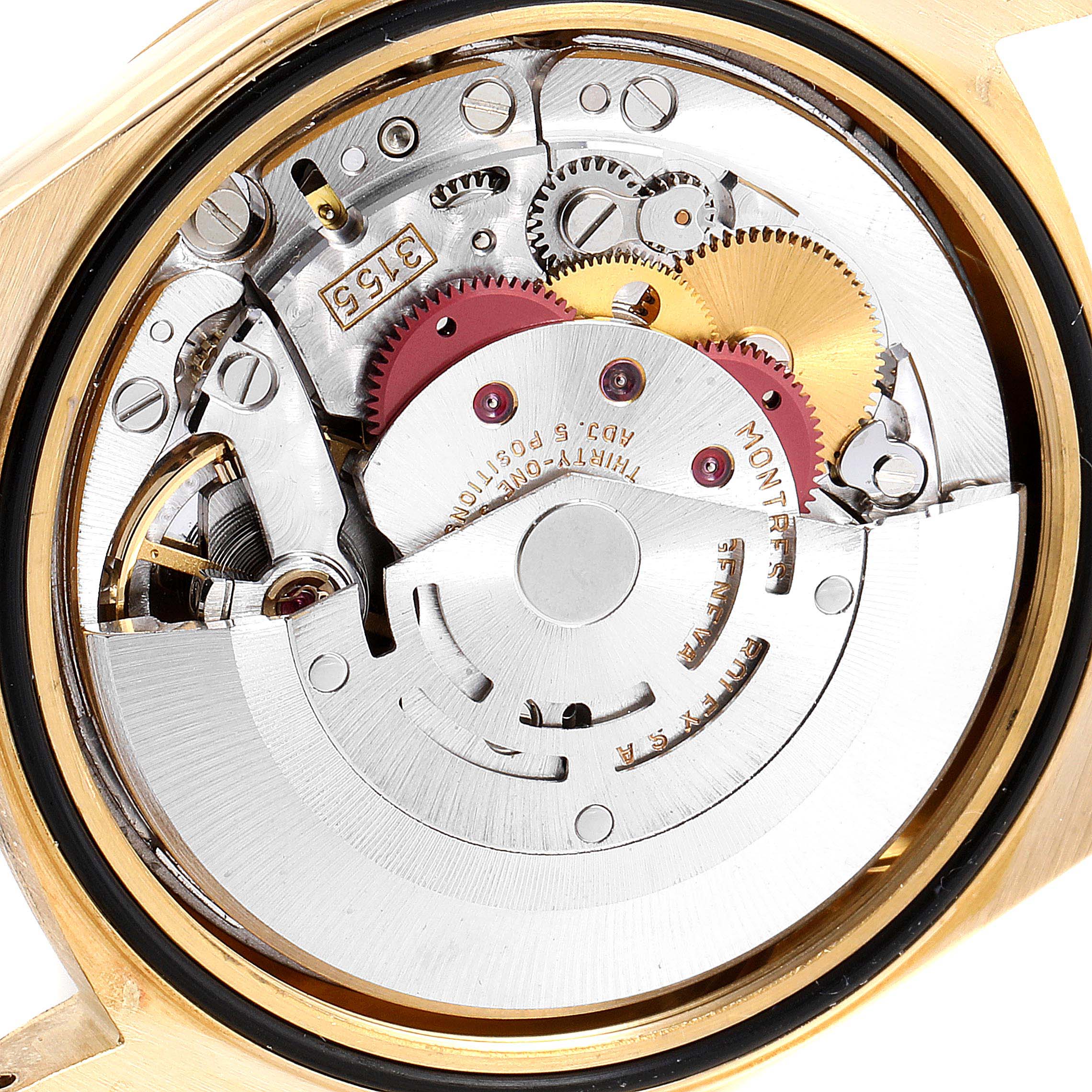 The image shows a close-up view of the inner mechanical movement of a Rolex President 18238 Men's Yellow Gold Champagne Dial 18238 Men's Yellow Gold Champagne Dial model watch.