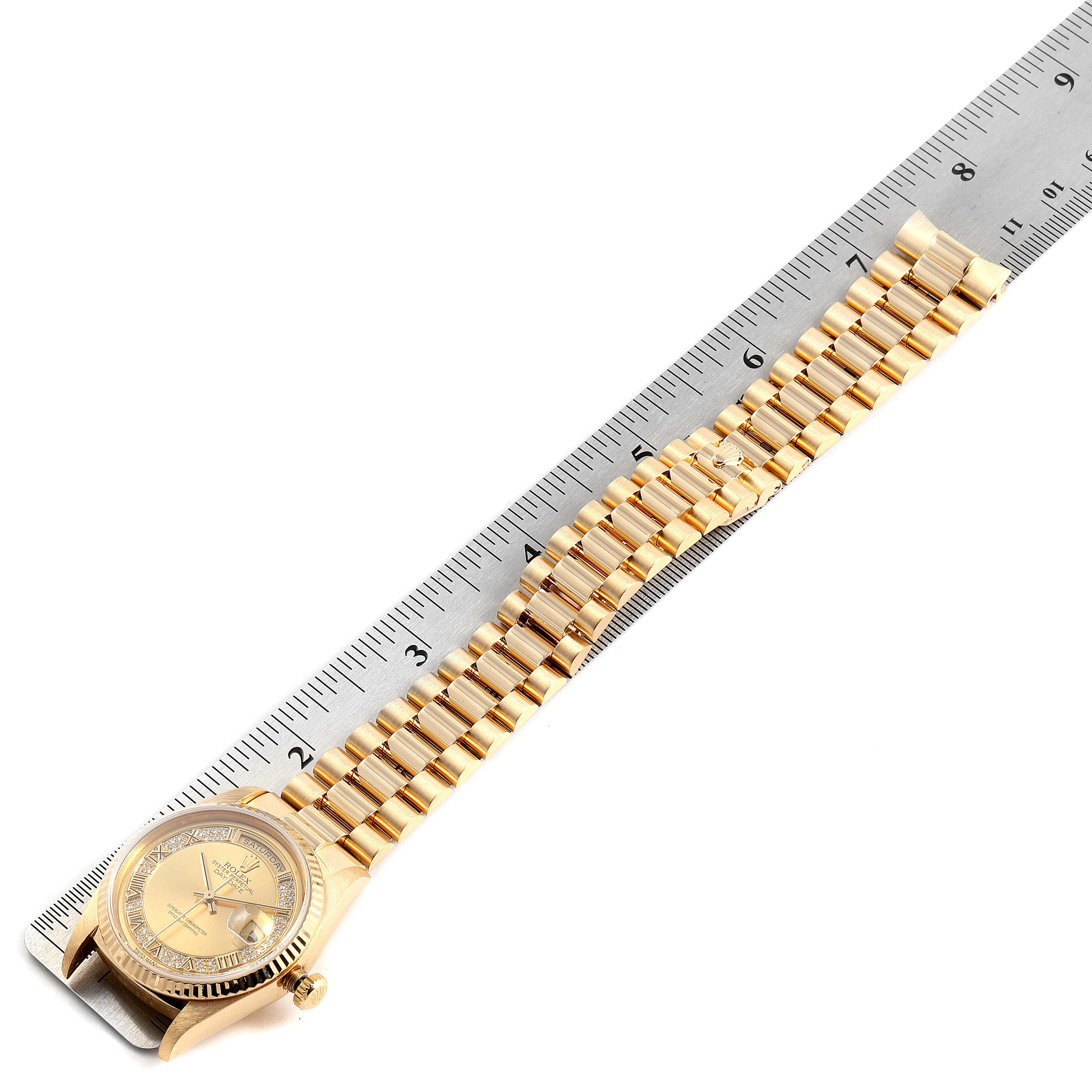 The image shows a top-down view of a Rolex President 18238 Men's Yellow Gold Champagne Dial 18238 Men's Yellow Gold Champagne Dial model, highlighting its dial and bracelet alongside a ruler for scale.