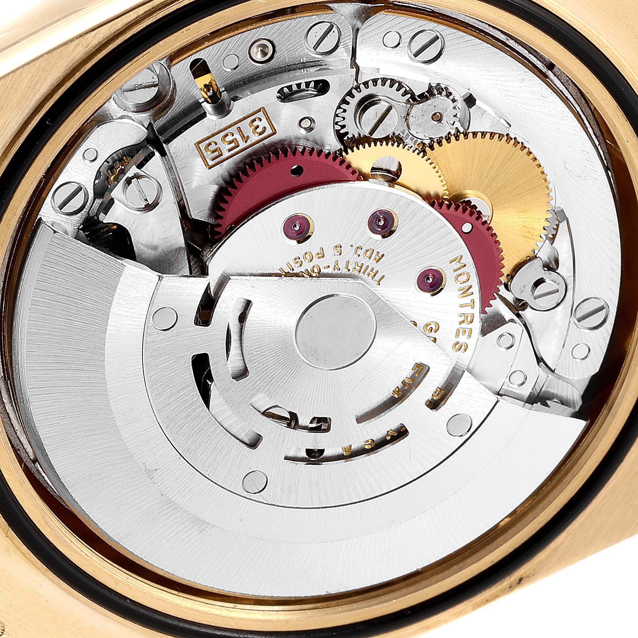 The image shows a close-up of the internal mechanism of a Rolex President 18238 Men
s Yellow Gold Champagne Dial 18238 Men
s Yellow Gold Champagne Dial model watch from the back.