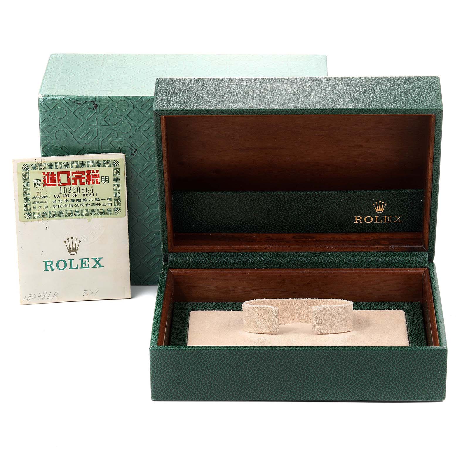 This image shows an open Rolex President 18238 Men
s Yellow Gold Champagne Dial 18238 Men
s Yellow Gold Champagne Dial model watch box, along with its outer box and accompanying paperwork.