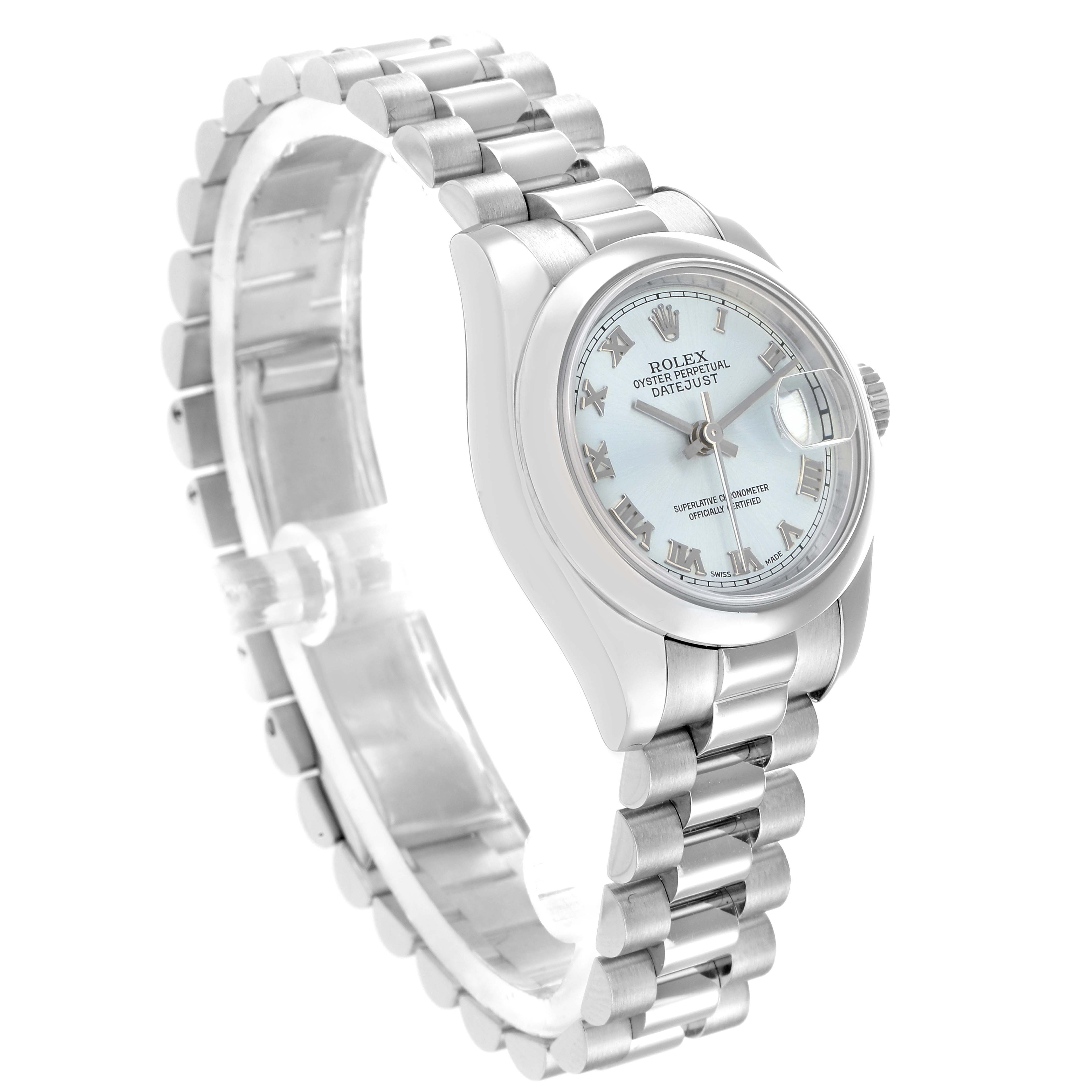 The Rolex President 179166 Women
s Platinum Blue Dial model watch is shown at an angle highlighting the bracelet and face, displaying its details and craftsmanship.