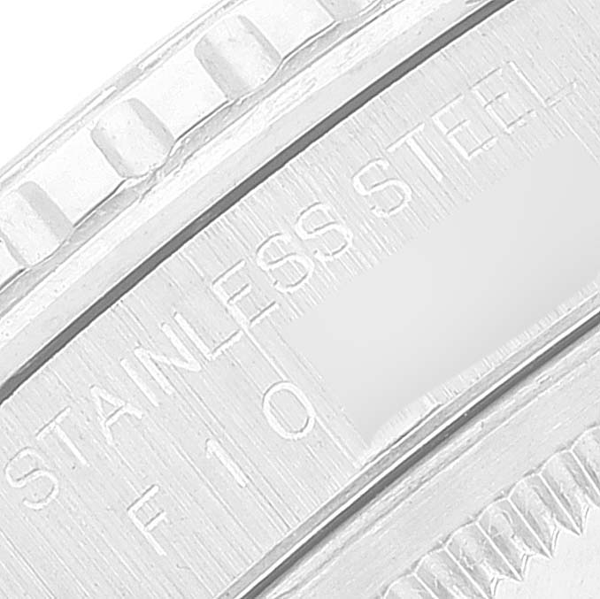 This close-up shows the engraved bezel and part of the case back of the Rolex Turn-o-Graph 16264 Men's Stainless Steel White Dial 16264 Men's Stainless Steel White Dial watch.