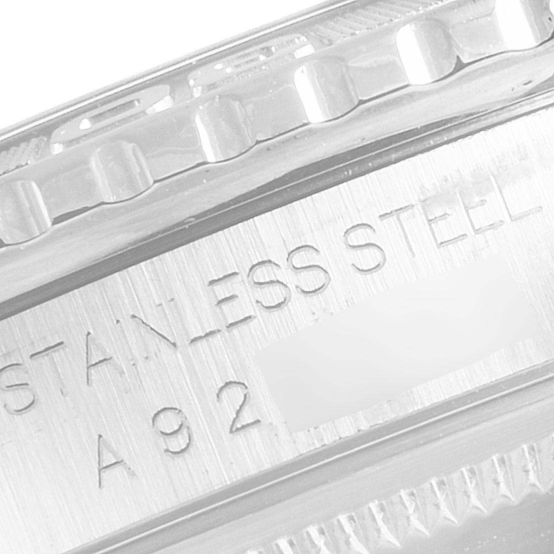 The image shows a close-up of the bezel and part of the casing with "STAINLESS STEEL" engraved on the Rolex Turn-o-Graph 16264 Men's Stainless Steel Silver Dial 16264 Men's Stainless Steel Silver Dial model.