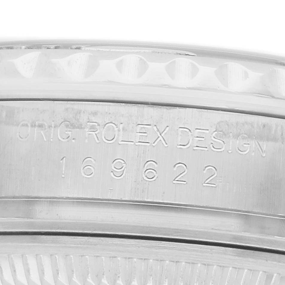 The image shows the side of a Rolex Yacht-Master 169622 Women
s Stainless Steel Silver Dial watch, highlighting the engraved bezel and model number.