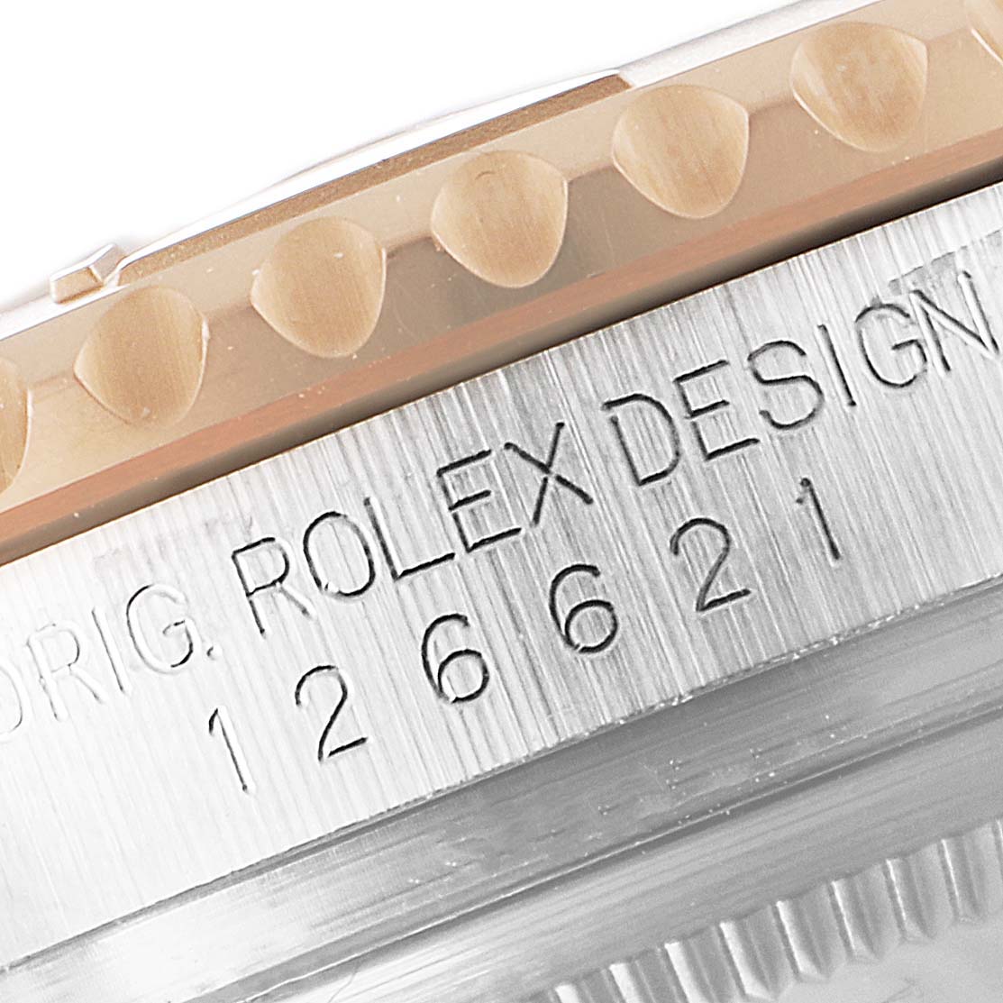 This image shows a close-up of the bezel and engraved details of the Rolex Yacht-Master 126621 Men
s Steel and Gold (two tone) Black Dial 126621 Men
s Steel and Gold (two tone) Black Dial watch.