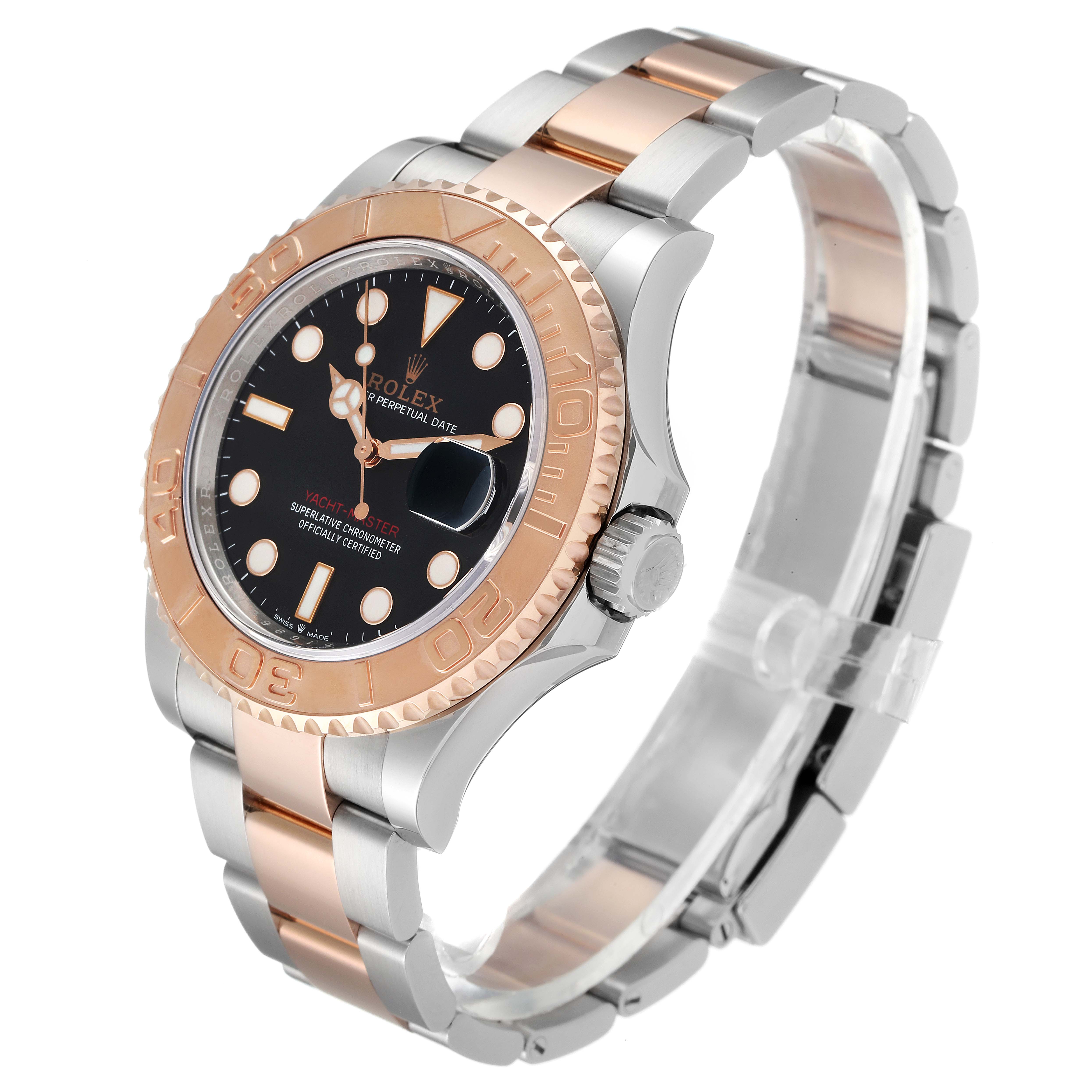 The Rolex Yacht-Master 126621 Men
s Steel and Gold (two tone) Black Dial 126621 Men
s Steel and Gold (two tone) Black Dial watch is shown at an angle, highlighting its black dial, rose gold bezel, and two-tone bracelet.