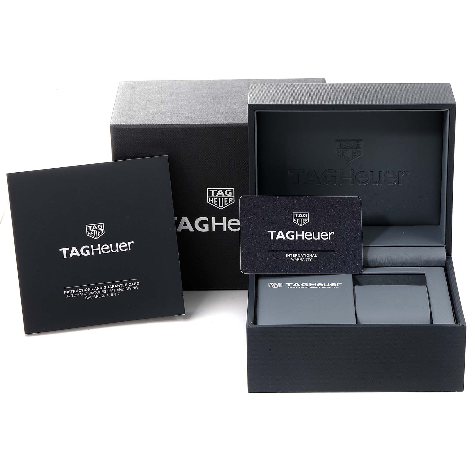 The image shows the packaging, warranty card, and instruction manual for the Tag Heuer Aquaracer WAY211C.BA0928 Men
s Stainless Steel Blue Dial WAY211C.BA0928 Men
s Stainless Steel Blue Dial model.