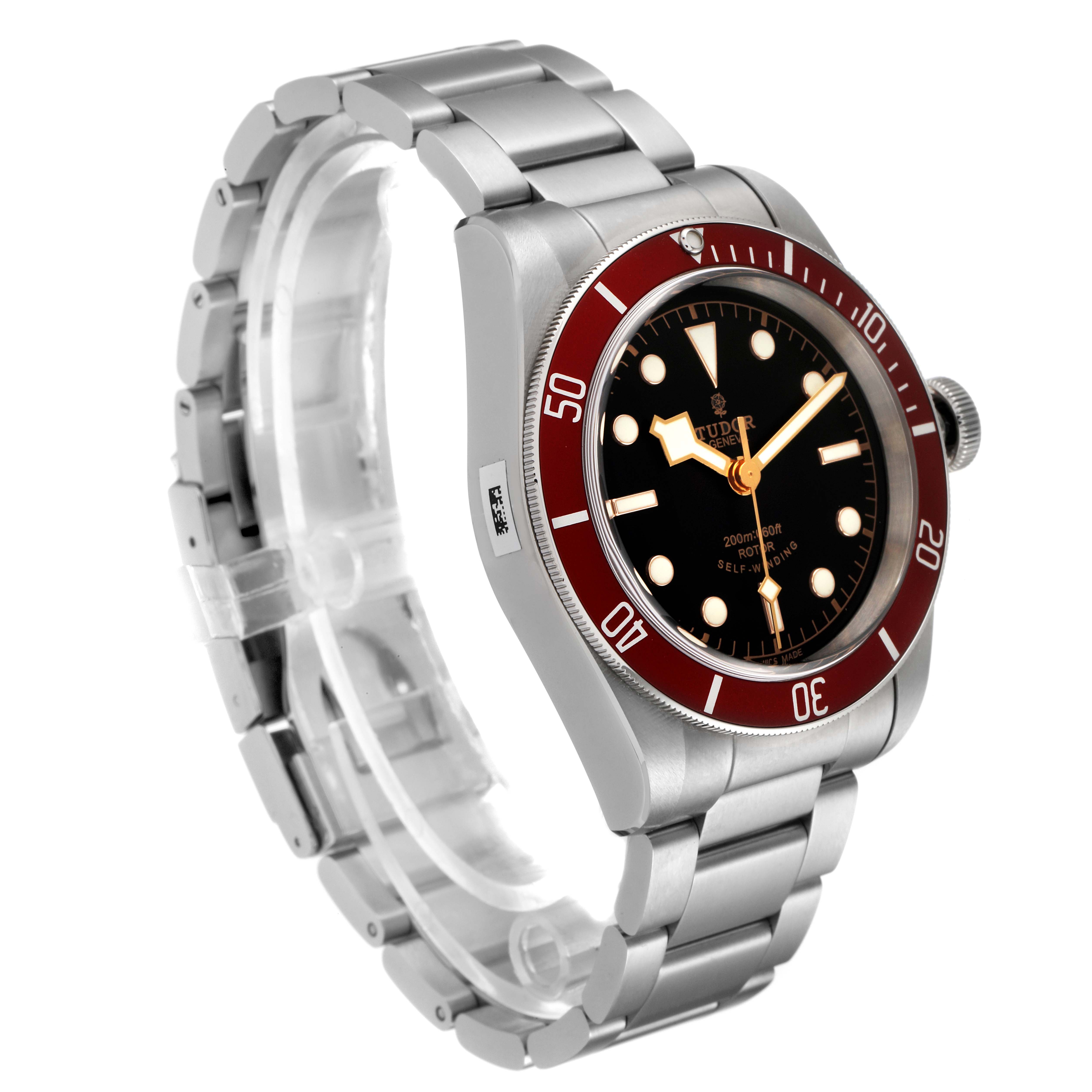 This Tudor Heritage Black Bay 79220R Men's Stainless Steel Black Dial 79220R Men's Stainless Steel Black Dial watch is shown at a three-quarter angle, highlighting its dial, bezel, and stainless steel bracelet.