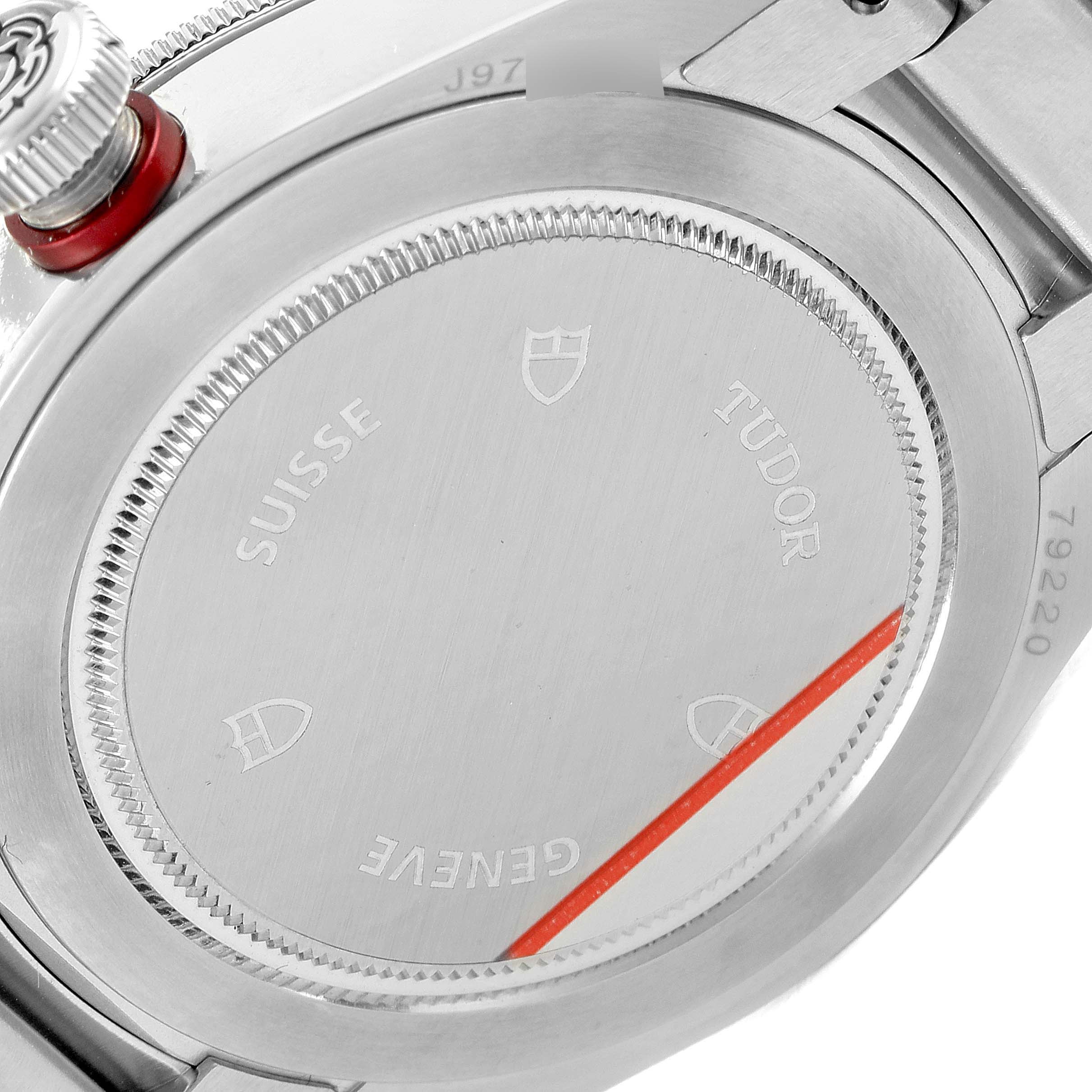 The image shows the back case of a Tudor Heritage Black Bay 79220R Men's Stainless Steel Black Dial 79220R Men's Stainless Steel Black Dial watch, highlighting its markings and stainless steel construction.