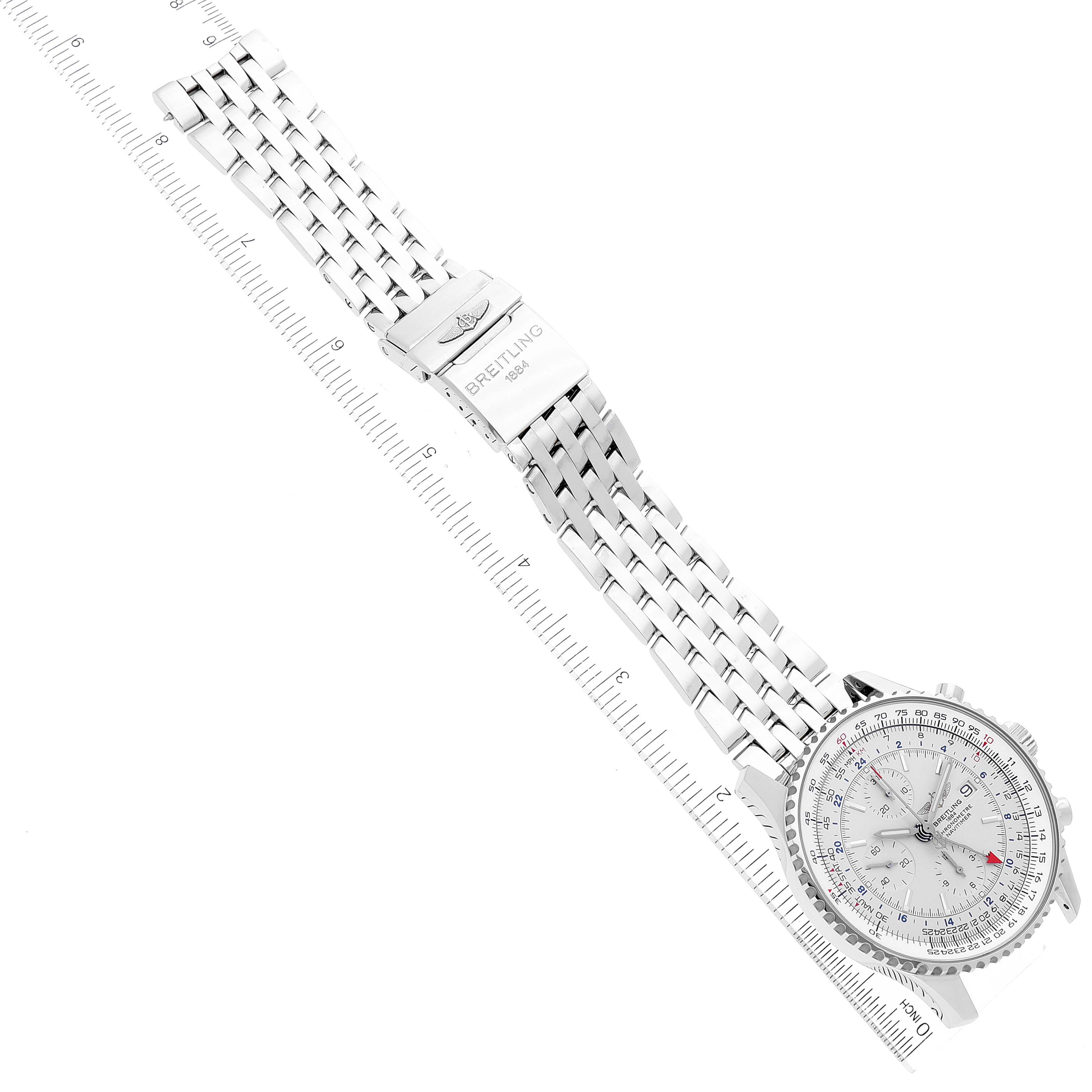 This Breitling Navitimer A24322 Men's Stainless Steel Silver Dial A24322 Men's Stainless Steel Silver Dial watch is shown from an overhead angle, displaying the dial, bezel, and bracelet alongside a ruler for scale.