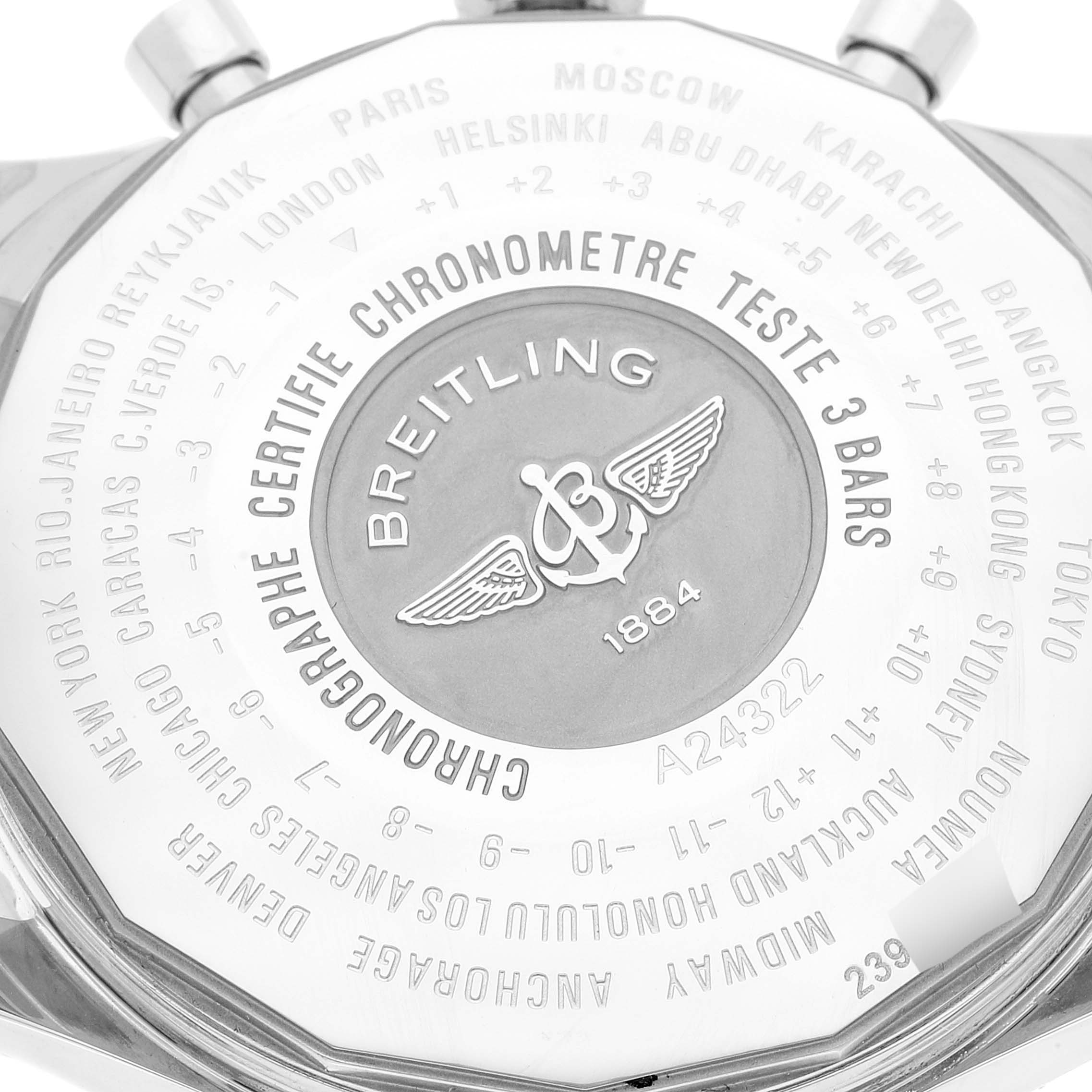 This image shows the back case of a Breitling Navitimer A24322 Men's Stainless Steel Silver Dial A24322 Men's Stainless Steel Silver Dial watch, featuring engraved text and the brand logo.