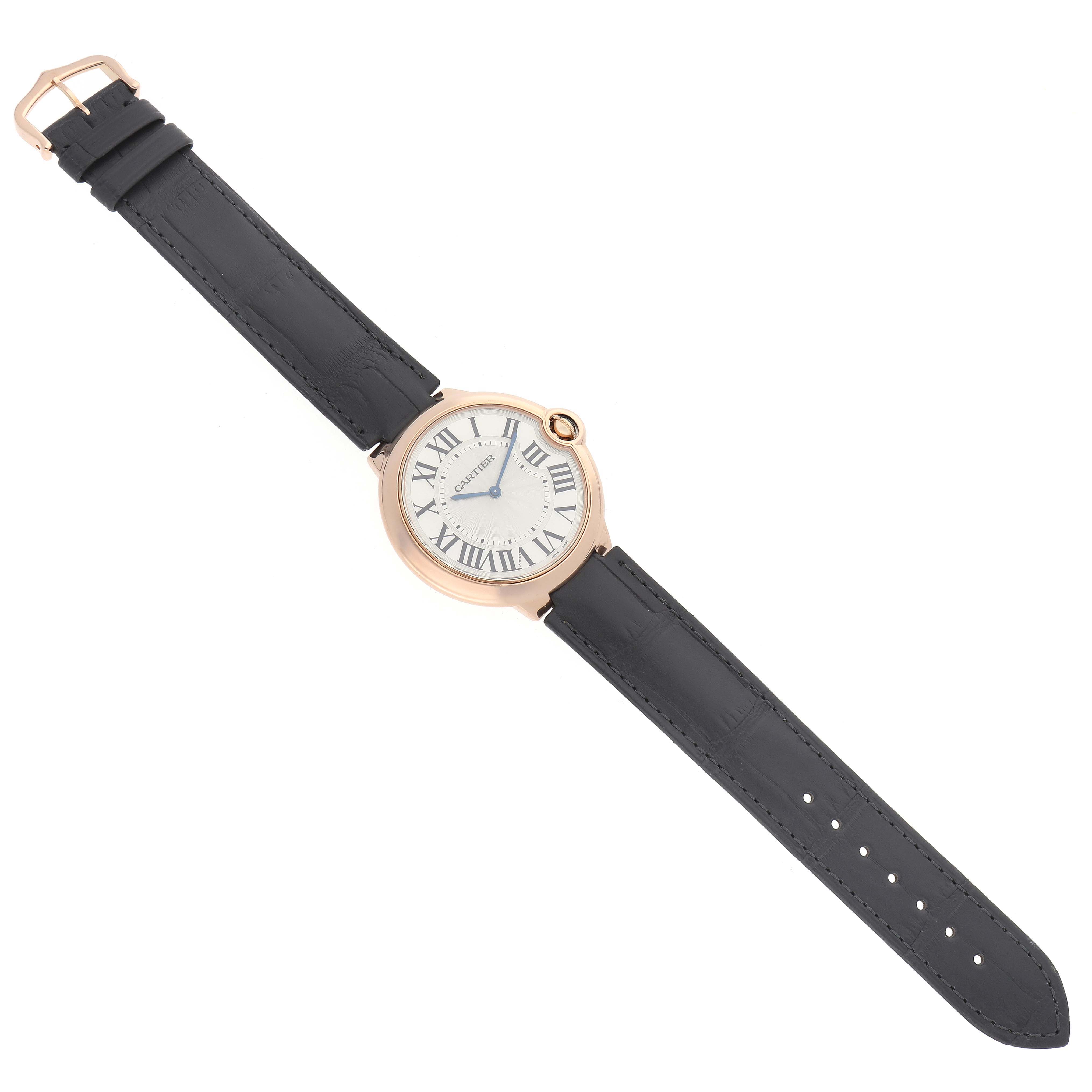 The Cartier Ballon Bleu W6920083 Men
s Rose Gold Silver Dial watch is shown from a top-down angle, displaying the full face, strap, and buckle.