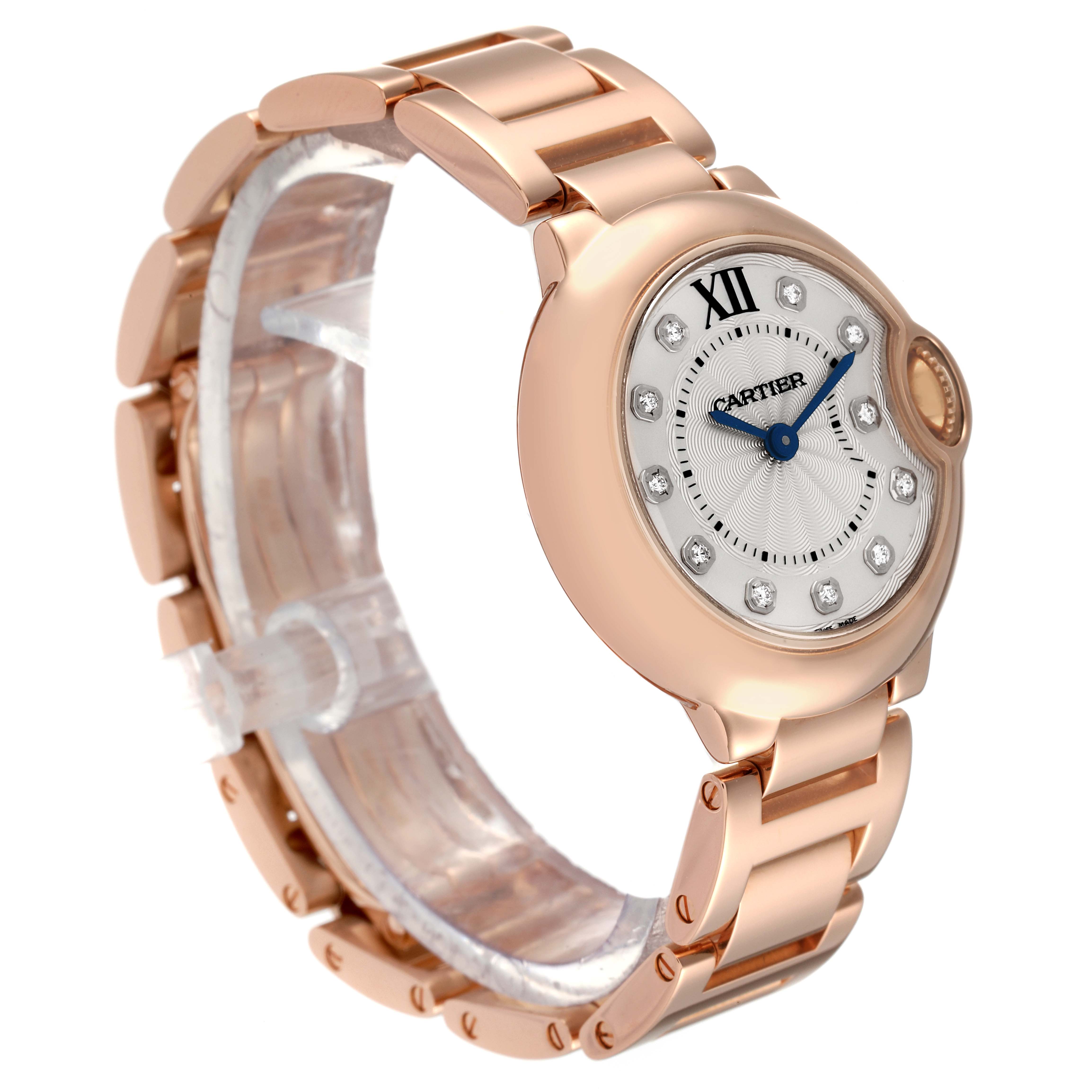 The image shows a side angle view of a Cartier Ballon Bleu WE902025 Women's Rose Gold Silver Dial WE902025 Women's Rose Gold Silver Dial watch, highlighting its rose gold bracelet and circular diamond-studded face.