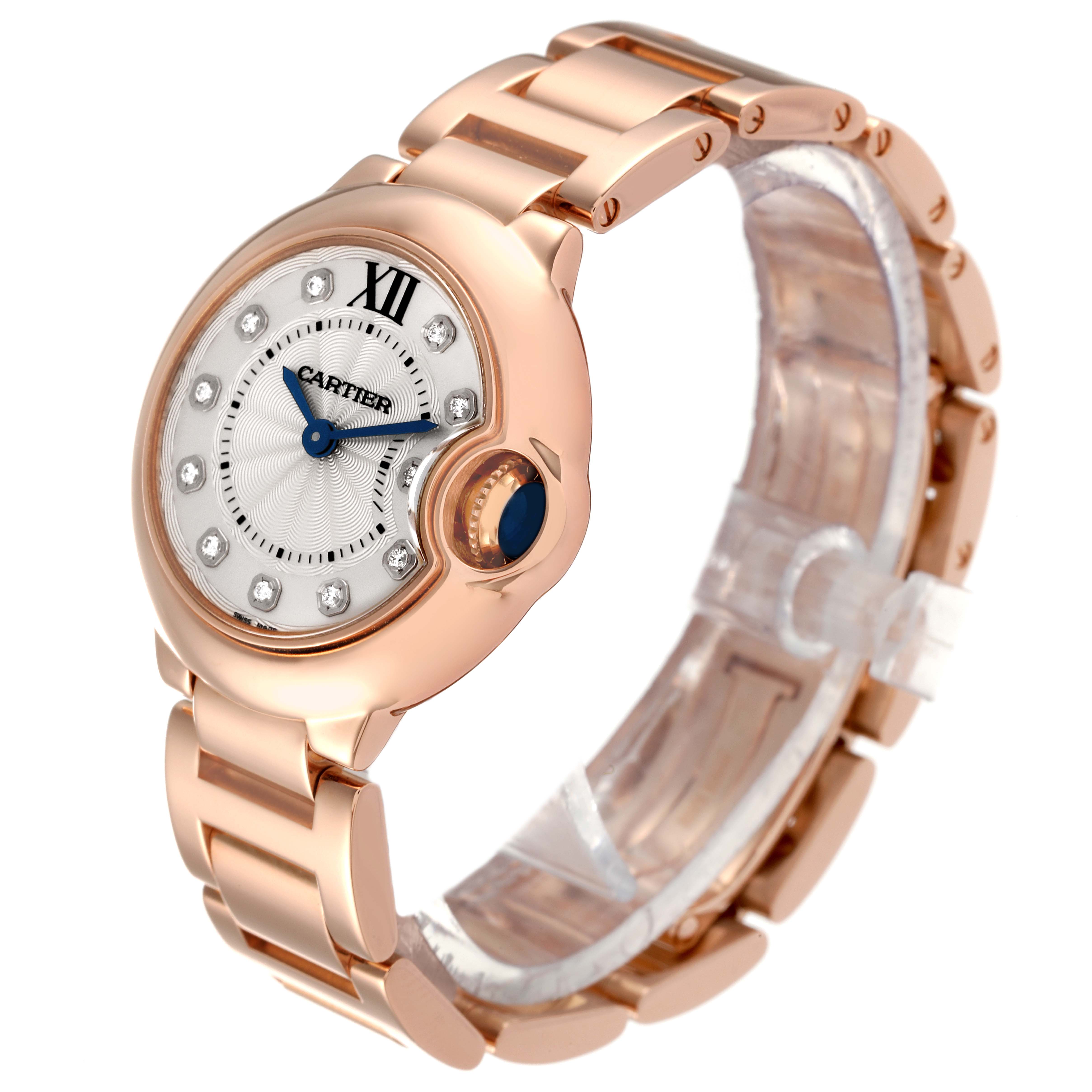 The image shows a Cartier Ballon Bleu WE902025 Women's Rose Gold Silver Dial WE902025 Women's Rose Gold Silver Dial watch at a slight angle, highlighting its rose gold bracelet, face, and distinctive crown.