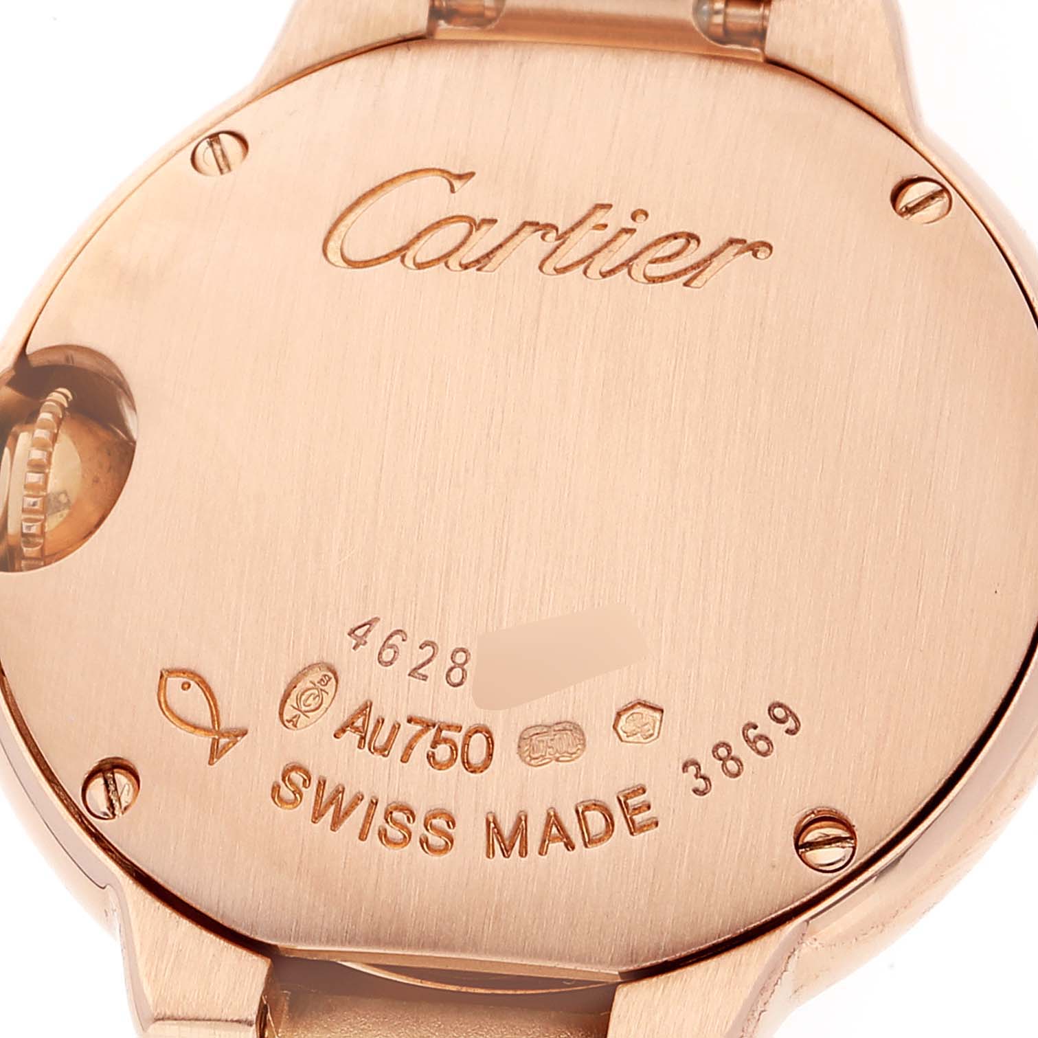 This is an image of the back case of a Ballon Bleu model by Cartier, showcasing the engraving and hallmark details.