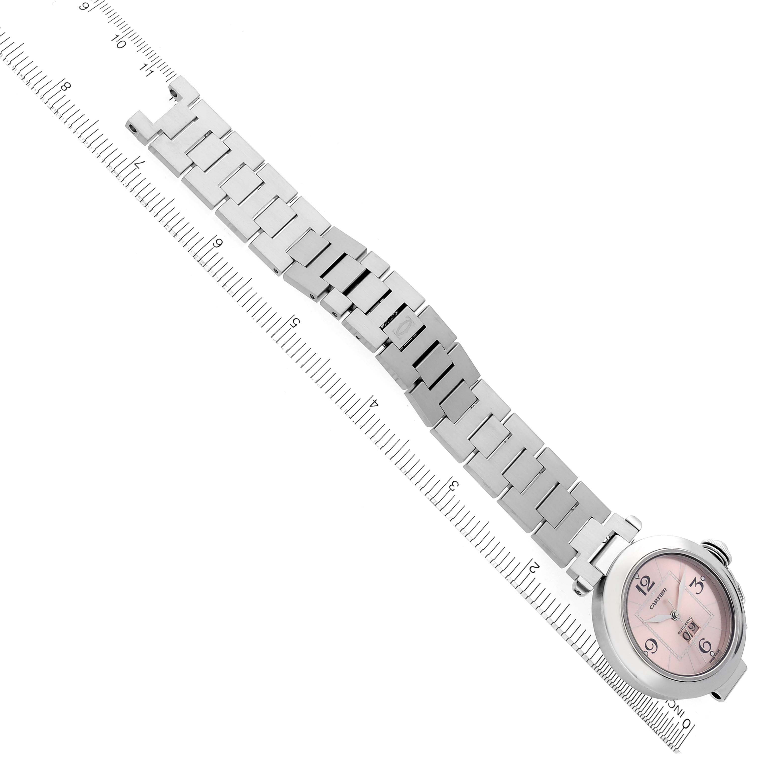 The Cartier Pasha 56624 Women
s Stainless Steel Pink Dial 56624 Women
s Stainless Steel Pink Dial watch is displayed at an angle, showing the full bracelet and the watch face.