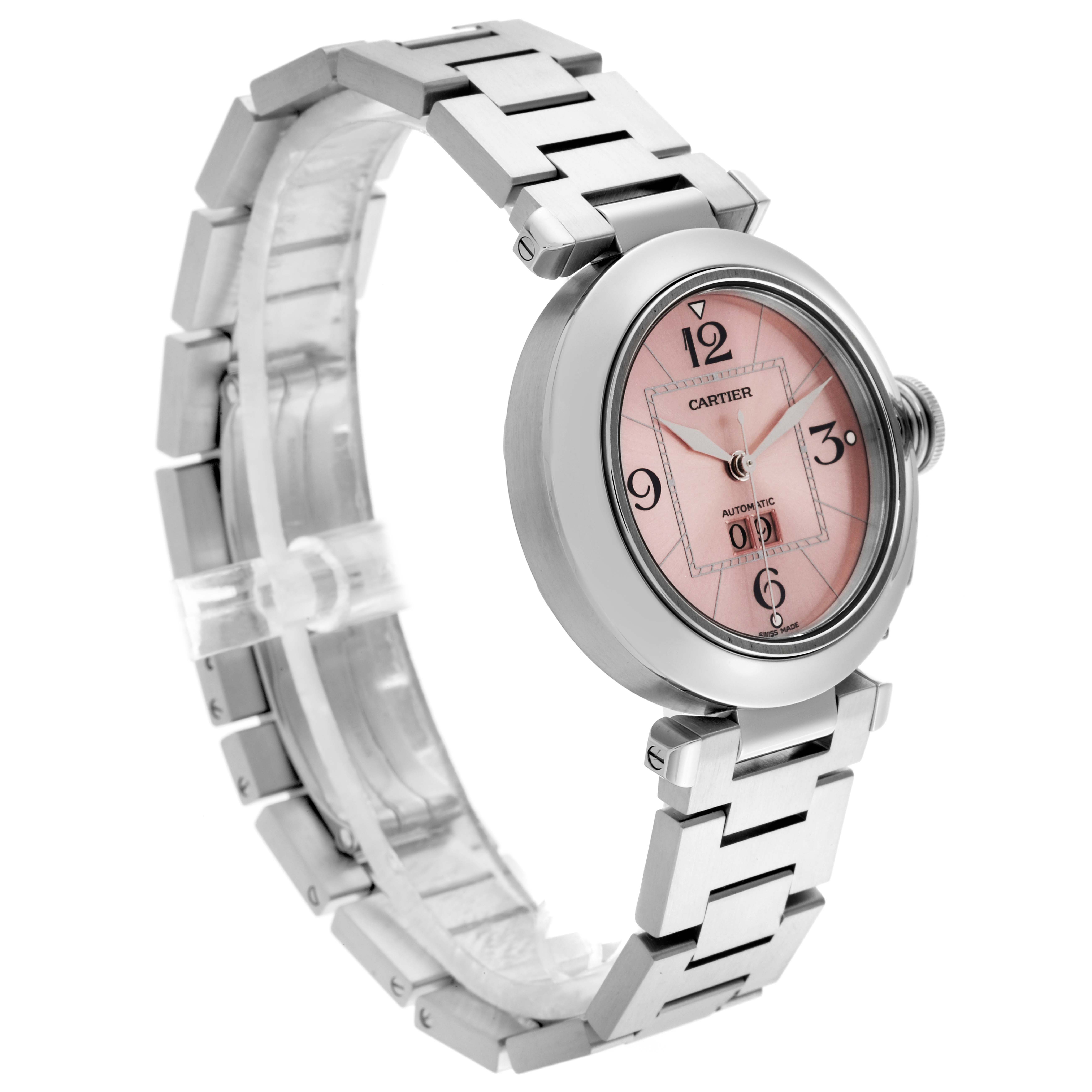 The Cartier Pasha W31058M7 Women's Stainless Steel Pink Dial W31058M7 Women's Stainless Steel Pink Dial watch is shown at a slight angle, highlighting its round face, pink dial, and stainless steel bracelet.