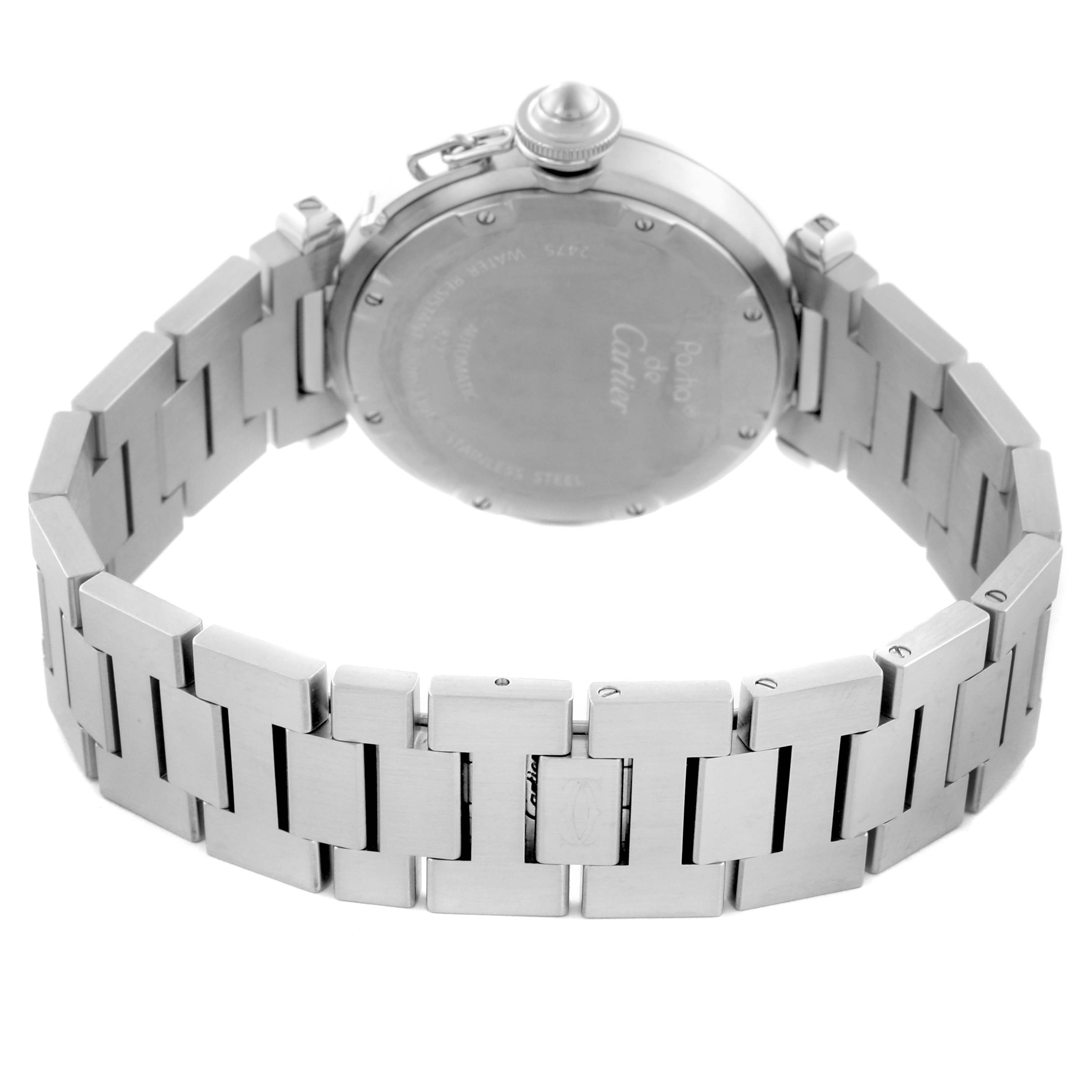 The Cartier Pasha W31058M7 Women's Stainless Steel Pink Dial W31058M7 Women's Stainless Steel Pink Dial watch is shown from the back, highlighting its case back and metal bracelet.