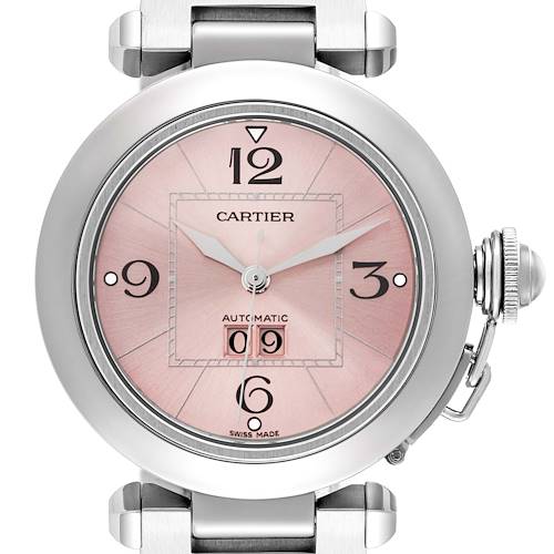The Cartier Pasha watch is shown from the front, featuring its pink dial, numerals, hands, date window, and crown.