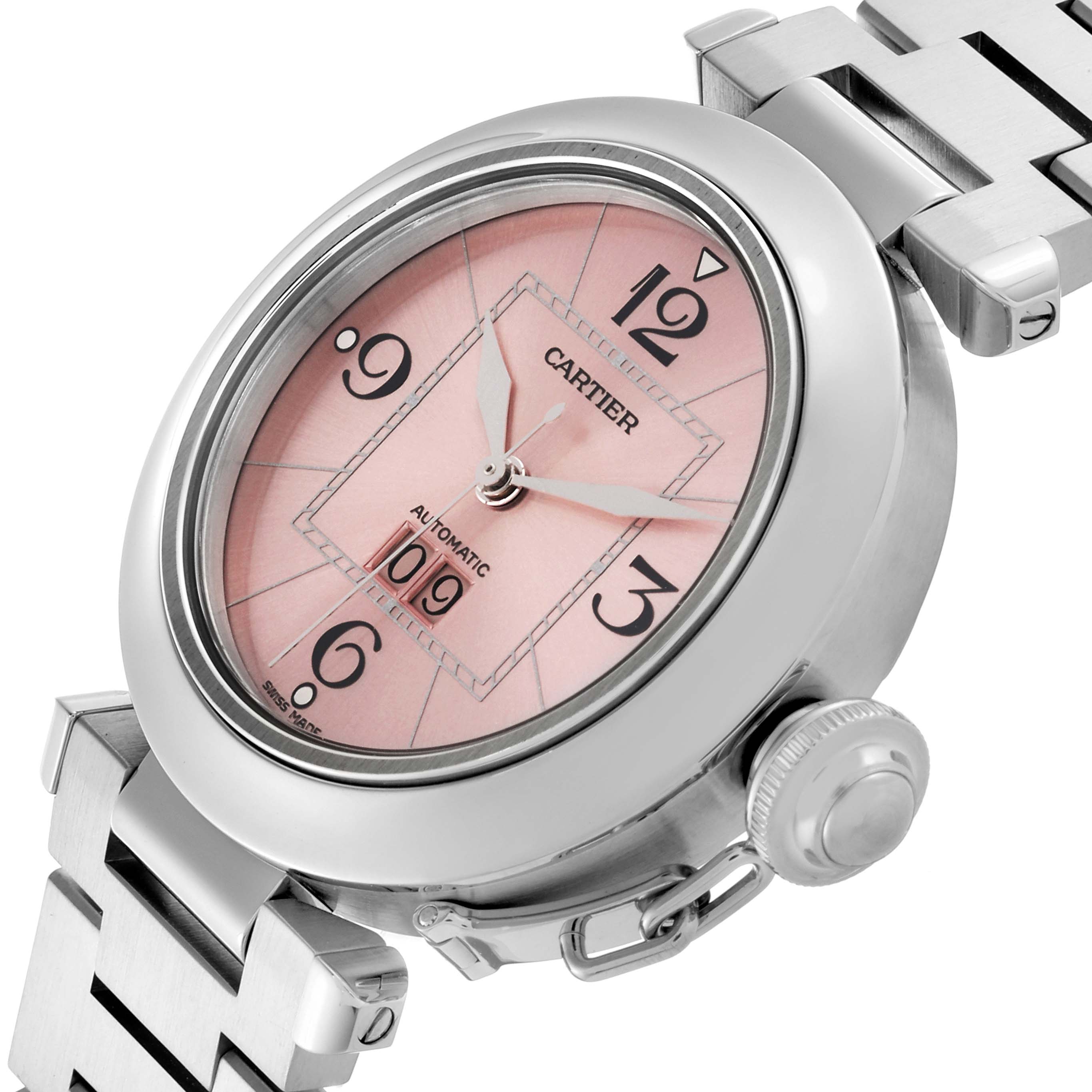 The Cartier Pasha W31058M7 Women's Stainless Steel Pink Dial W31058M7 Women's Stainless Steel Pink Dial watch is shown from an angled side view, highlighting the pink dial, bezel, crown, and part of the strap.