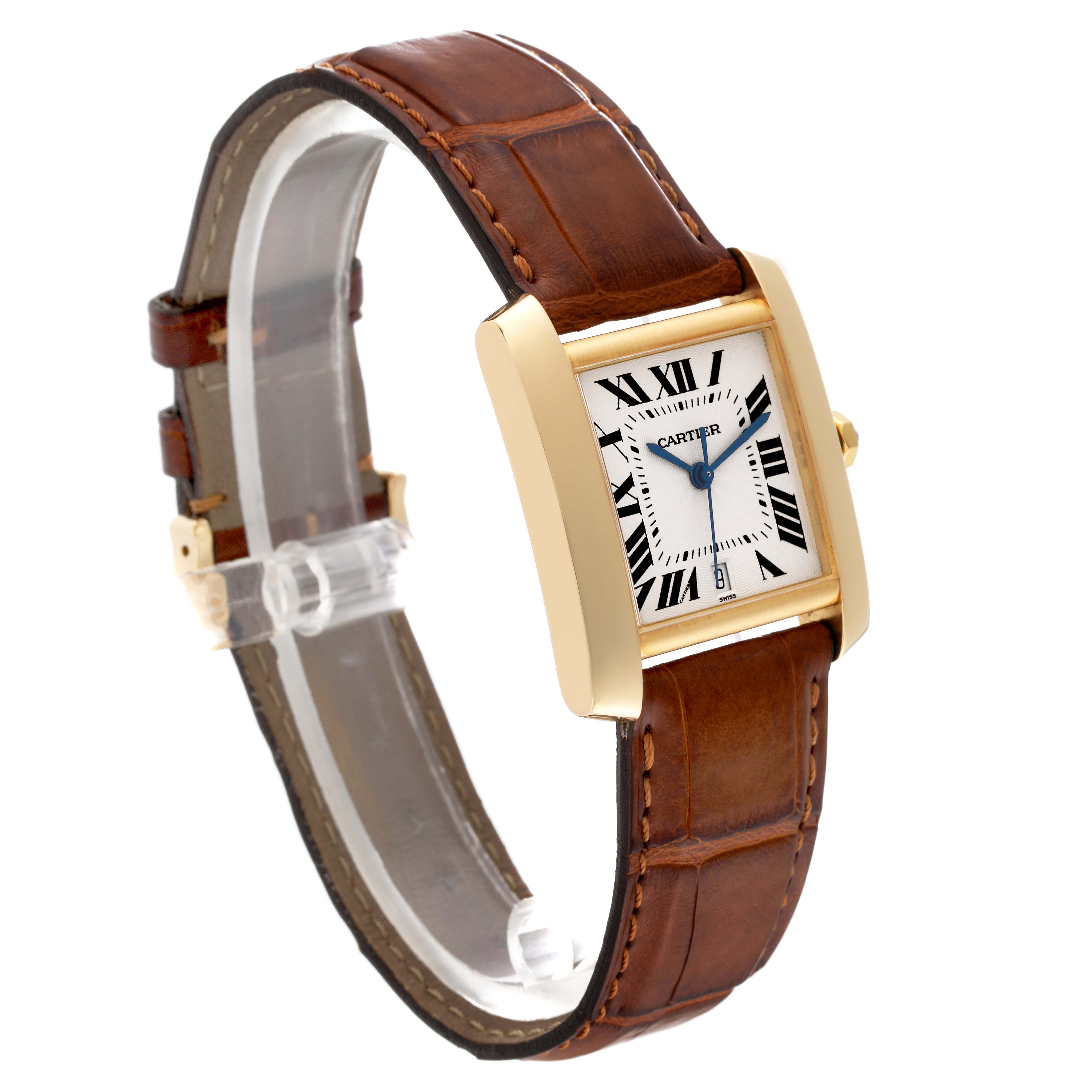 The Cartier Tank Française watch is shown at a three-quarter angle, displaying its gold case, Roman numeral dial, and brown leather strap.