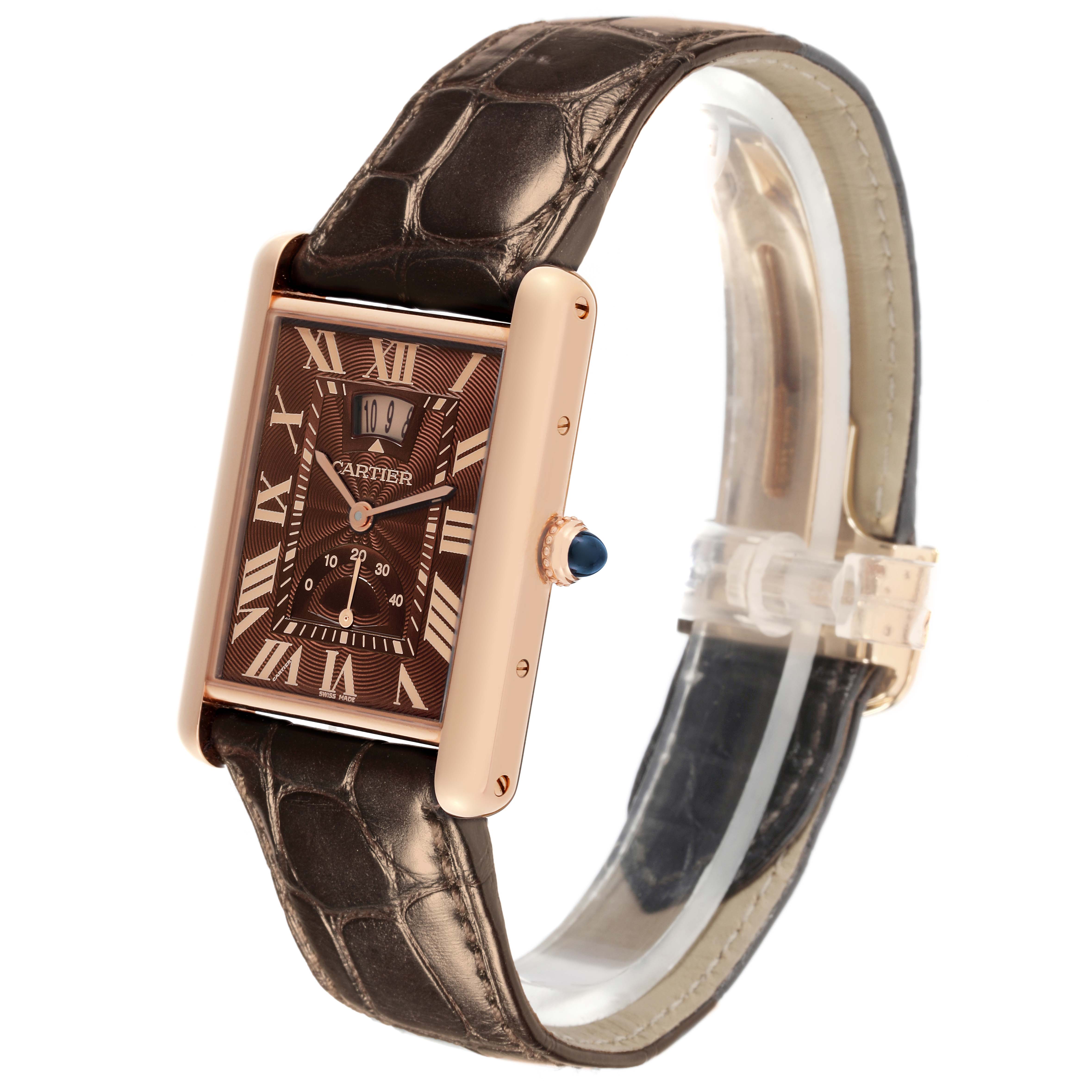 The Cartier Tank Louis W1560002 Men's Rose Gold Brown Dial W1560002 Men's Rose Gold Brown Dial watch is shown at a tilted angle, highlighting the face, crown, and leather strap.