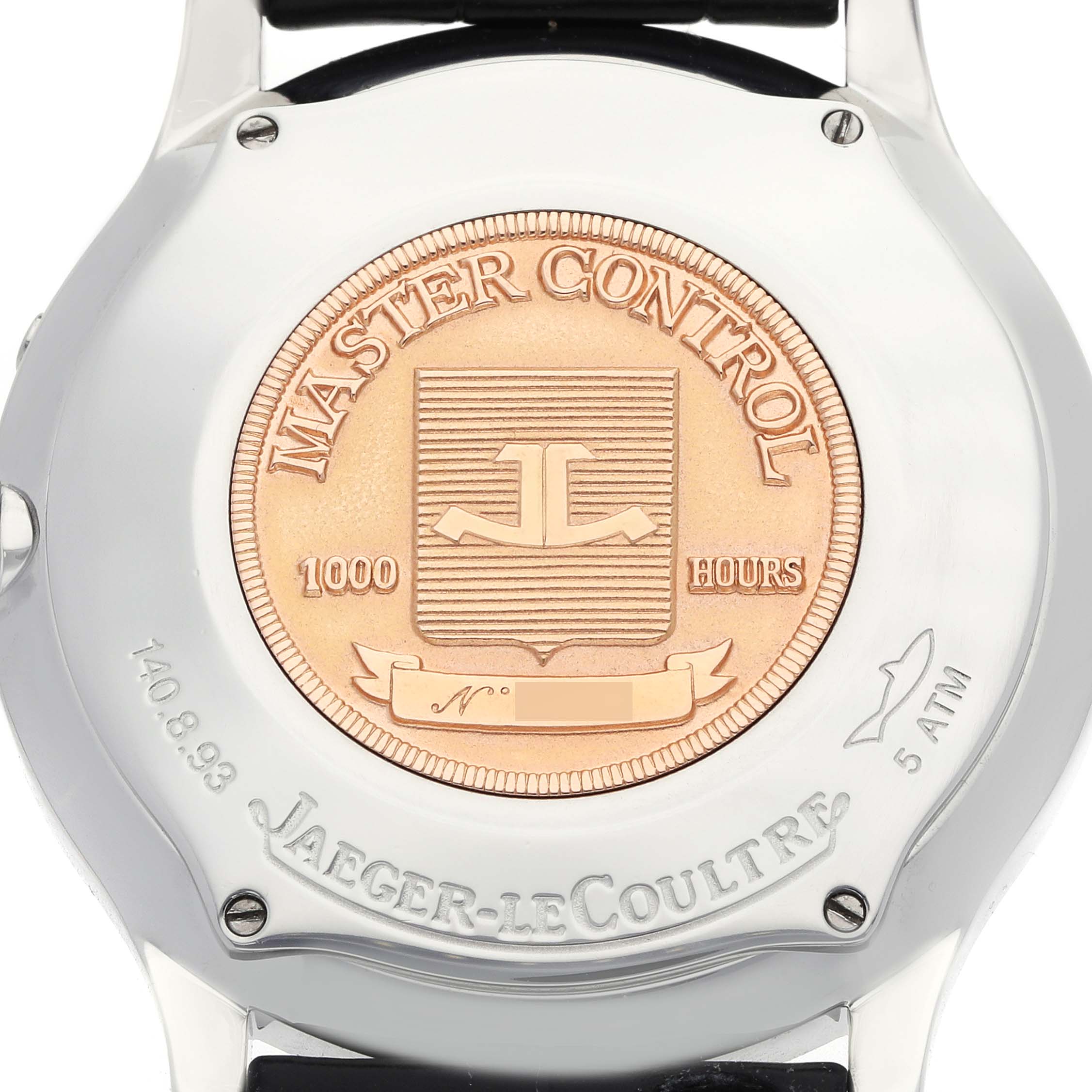 The image shows the back of the Jaeger-LeCoultre Reverso watch, highlighting the Master Control seal and engravings.
