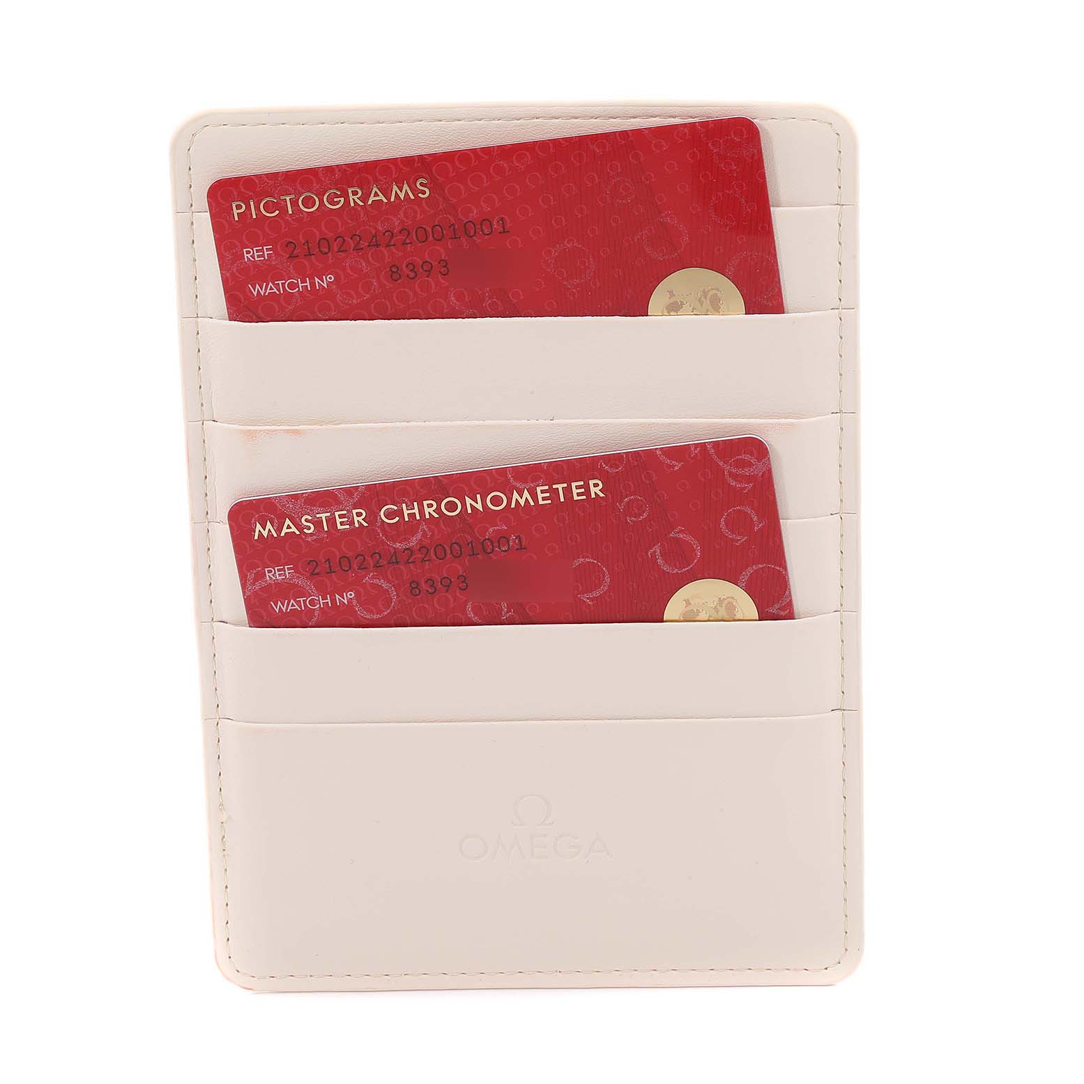 The image shows Omega Seamaster 210.22.42.20.01.001 Men
s Steel and Gold (two tone) Black Dial watch cards in a white cardholder, viewed from above.