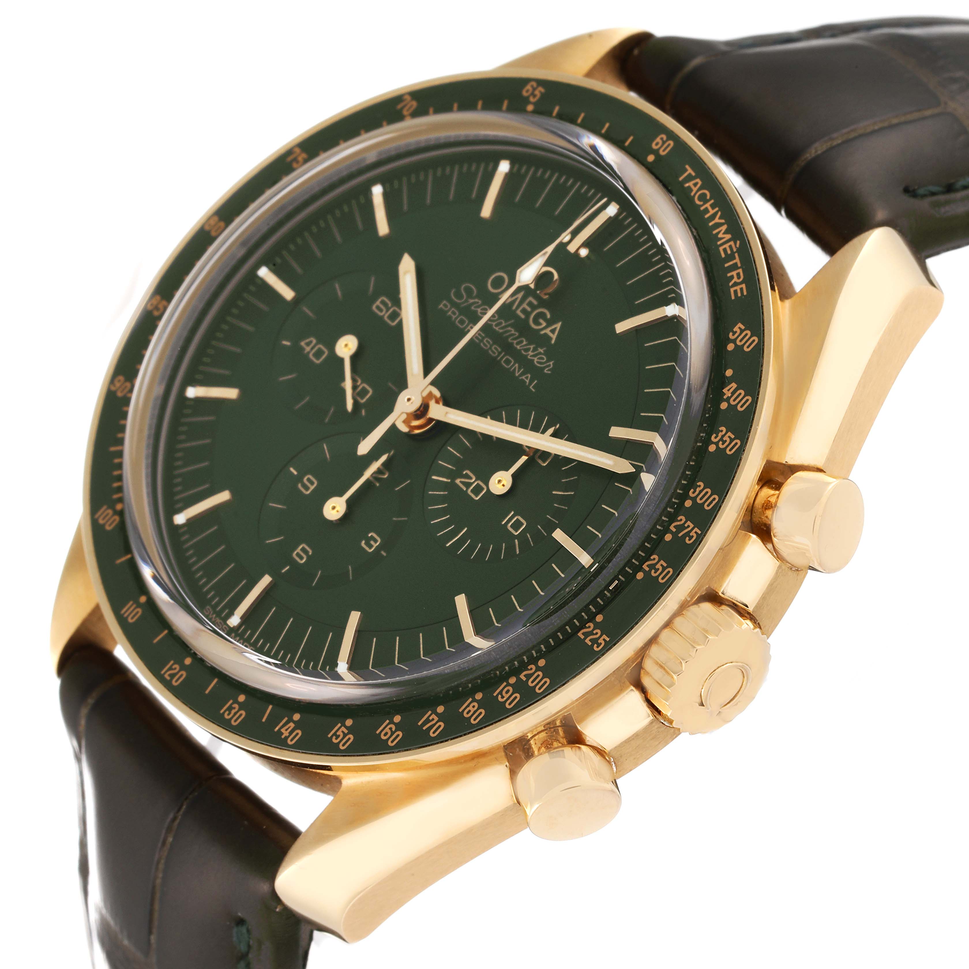 This image shows an Omega Speedmaster 310.63.42.50.10.001 Men's Yellow Gold Green Dial 310.63.42.50.10.001 Men's Yellow Gold Green Dial watch at an angle highlighting the dial, crown, pushers, and part of the strap.