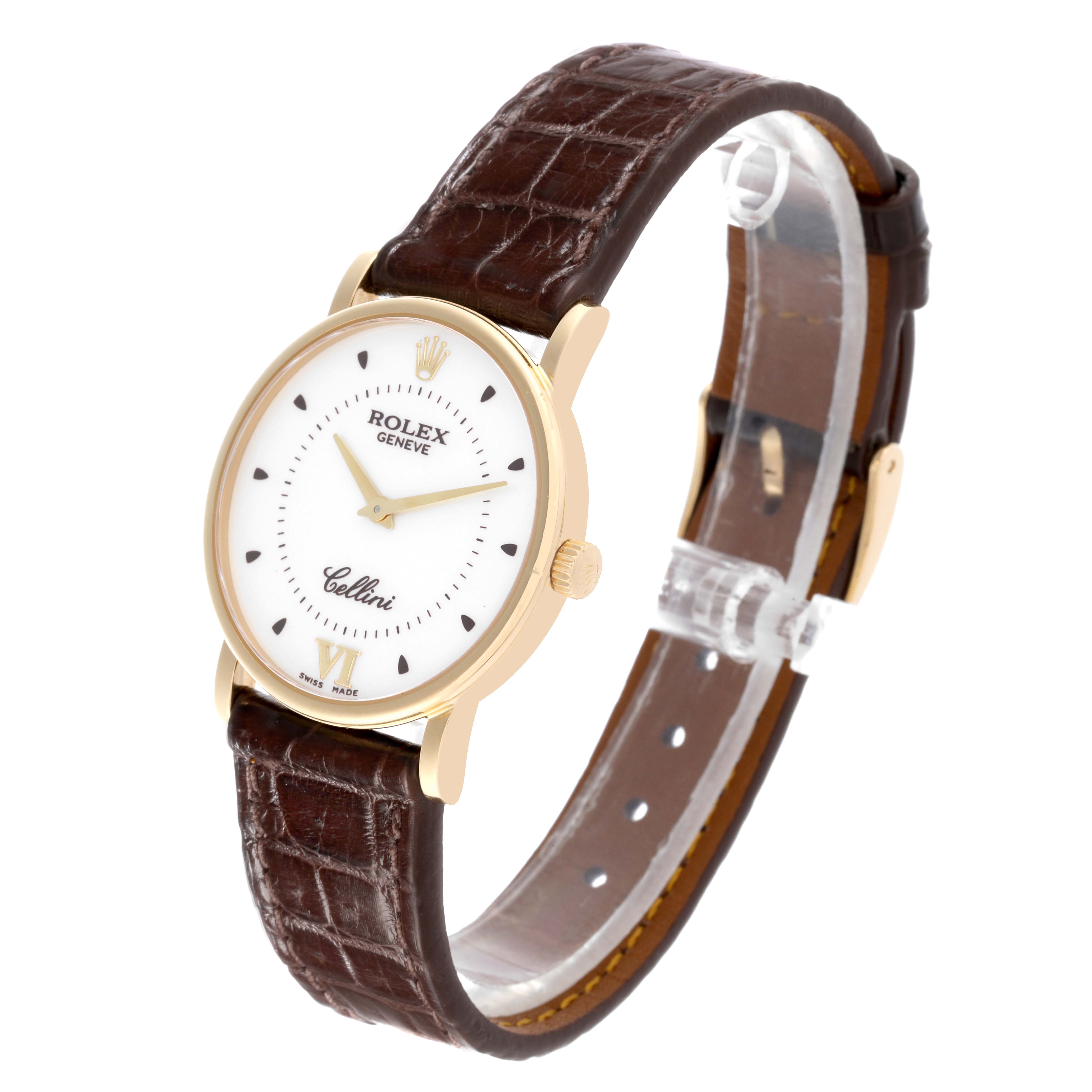 The Rolex Cellini 5115 Men's Yellow Gold Silver Dial 5115 Men's Yellow Gold Silver Dial watch is shown at an angle displaying the face, crown, and leather strap.