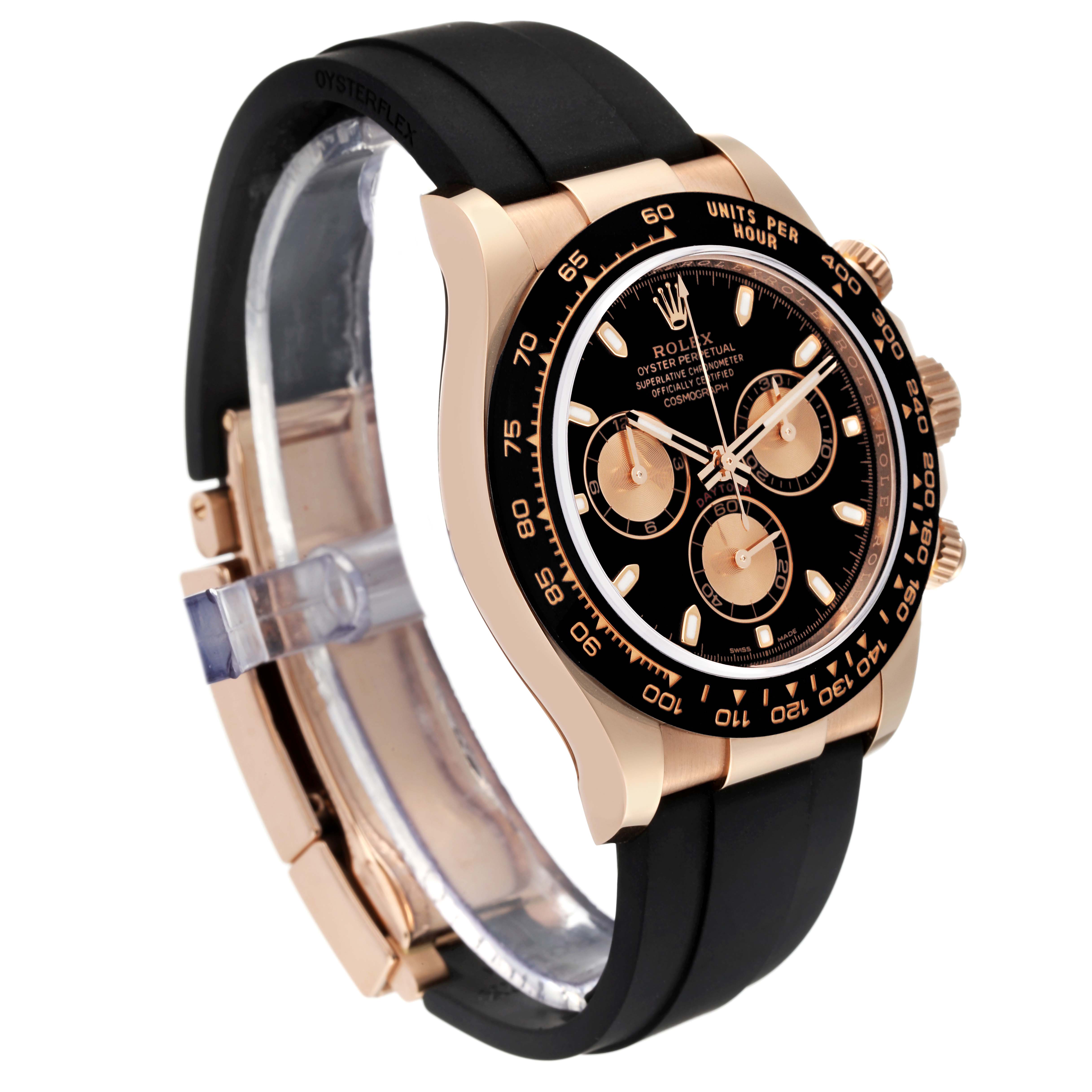 The image shows a side angle of a Rolex Daytona 116515LN Men's Rose Gold Black Dial 116515LN Men's Rose Gold Black Dial with a black dial and rose gold case, featuring a black rubber strap.