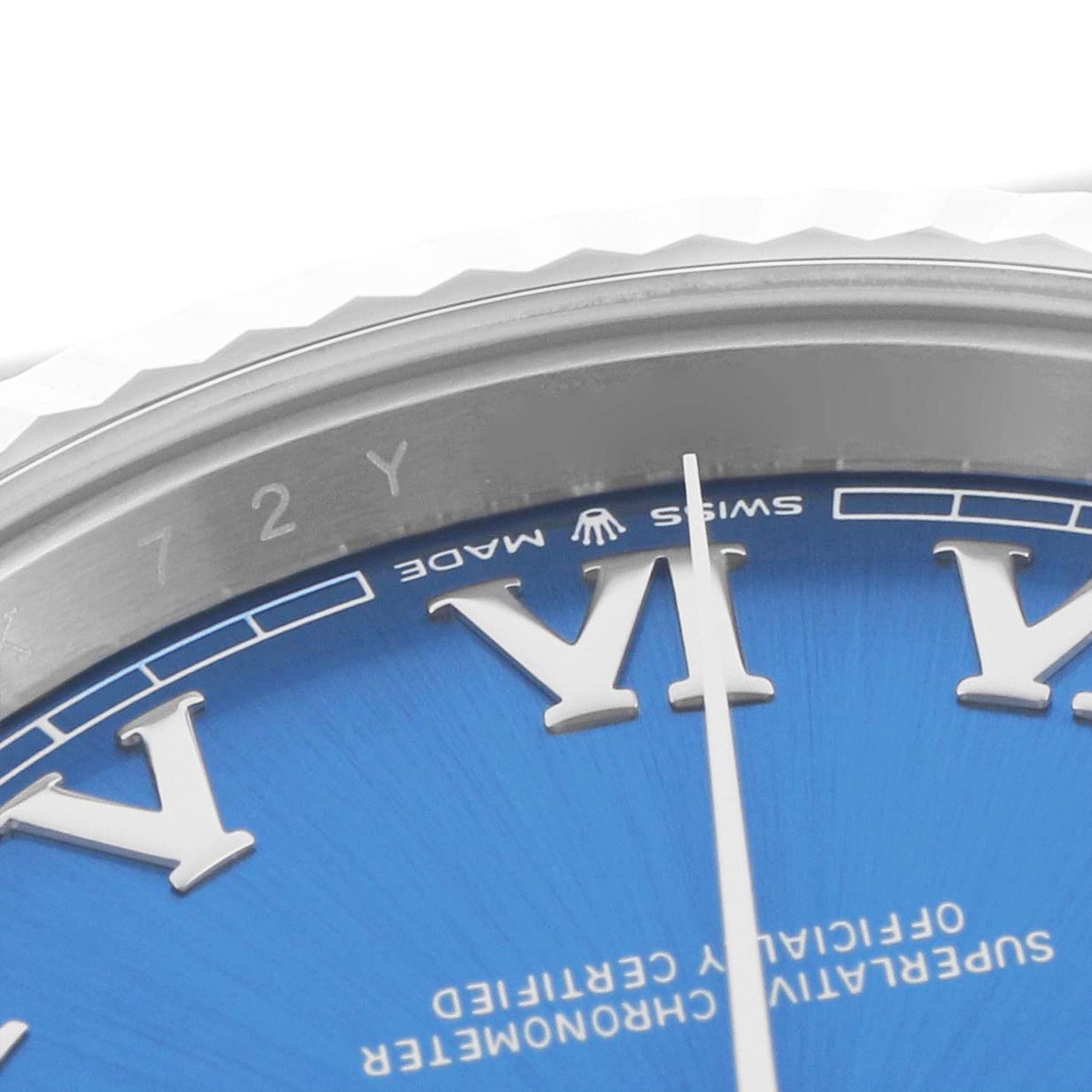 The image shows a detailed angle of the Rolex Datejust 41 126334 Men
s Stainless Steel Blue Dial
s blue dial, focusing on the Roman numerals and bezel.