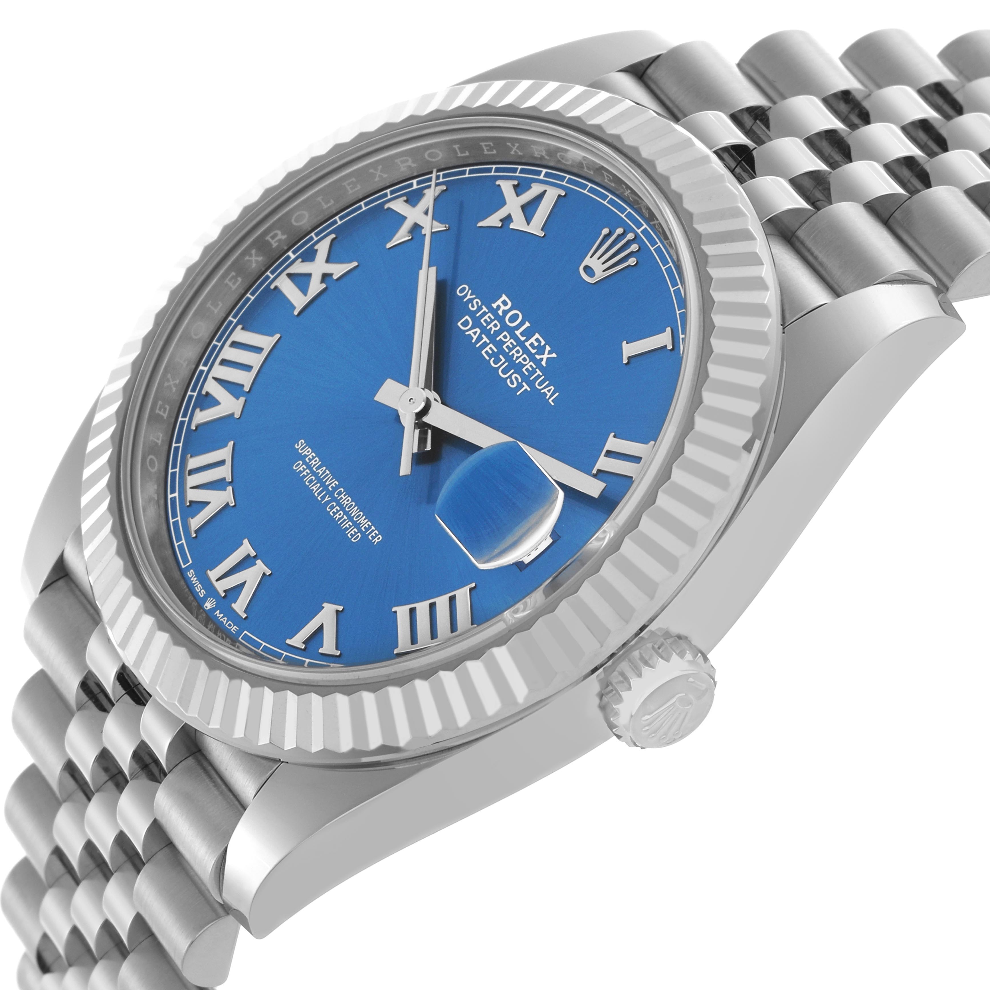 The Rolex Datejust 41 126334 Men
s Stainless Steel Blue Dial is shown from a side angle, highlighting the blue dial, fluted bezel, crown, and Jubilee bracelet.