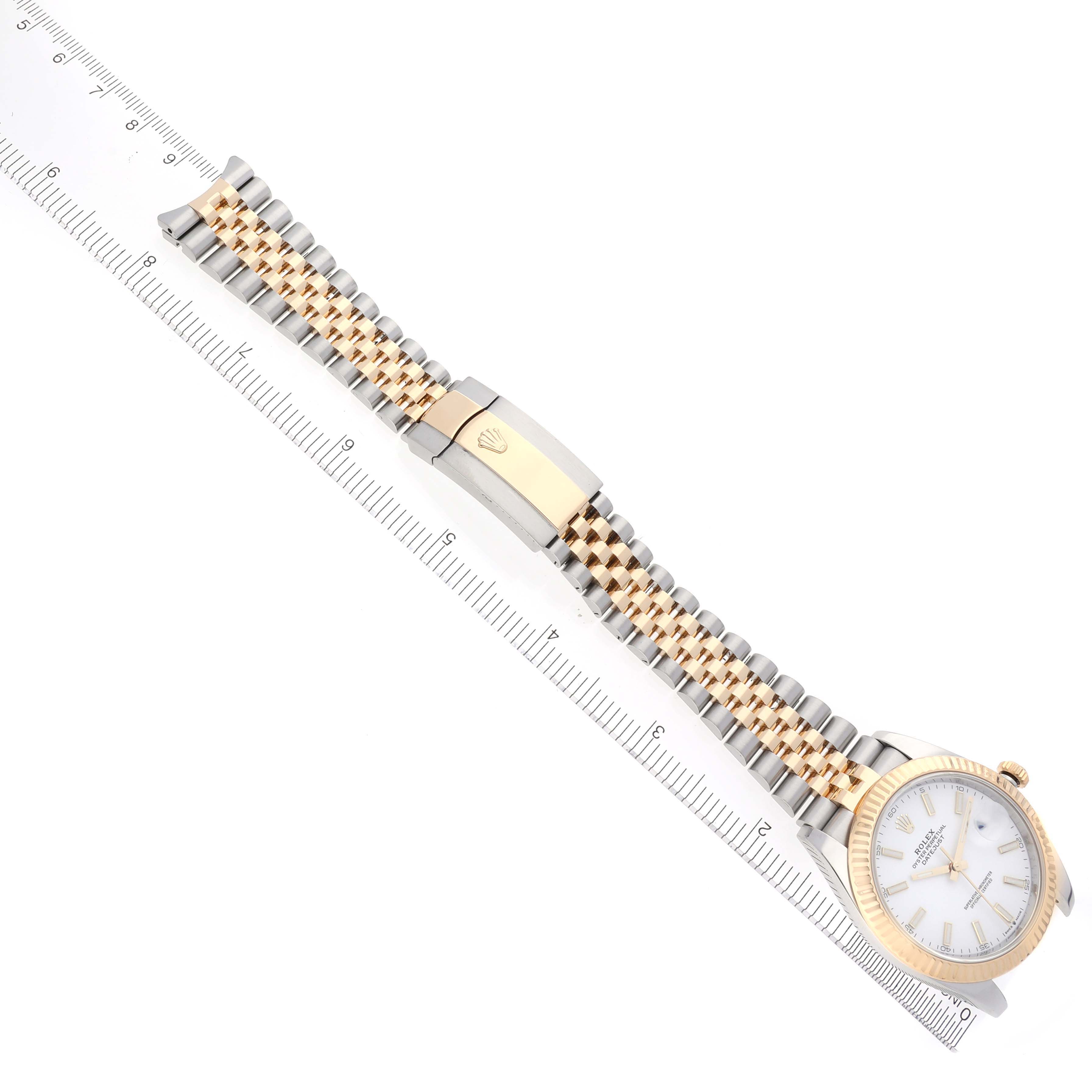 The Rolex Datejust 41 126333 Men's Steel and Gold (two tone) White Dial 126333 Men's Steel and Gold (two tone) White Dial watch is shown from a top-down angle, highlighting the bracelet, clasp, and face.