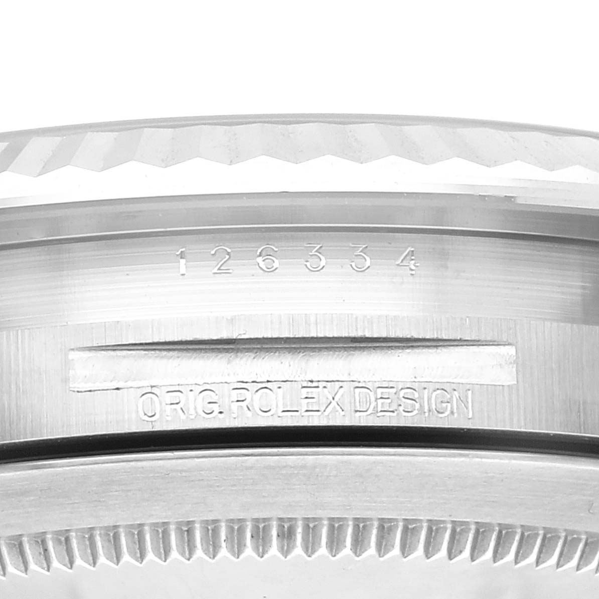 The image shows a close-up of the side of the Rolex Datejust 41 126334 Men's Stainless Steel White Dial 126334 Men's Stainless Steel White Dial model, featuring serial numbers and "ORIG. ROLEX DESIGN" engraving.