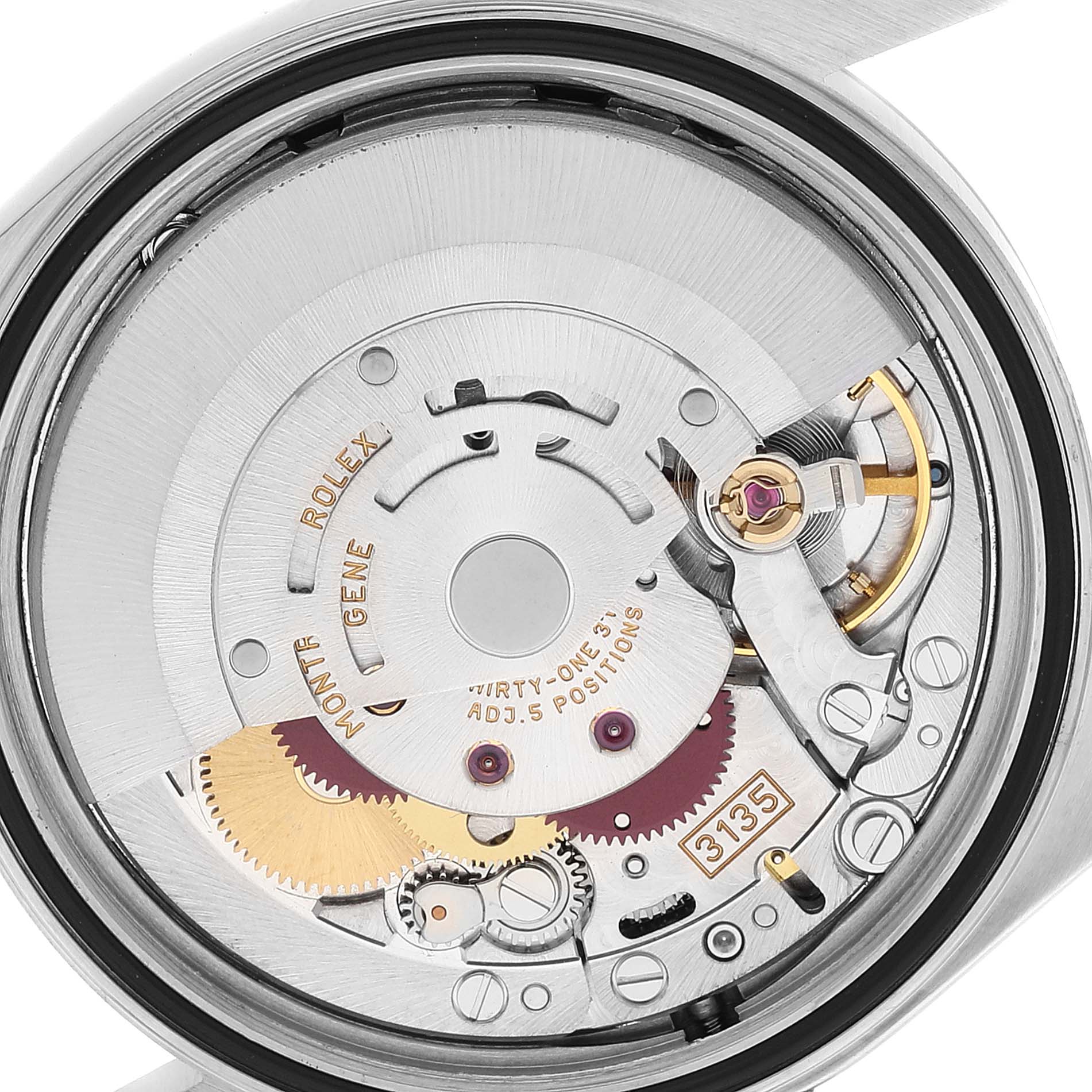 The image shows a close-up view of the Rolex Datejust 16200 Men's Stainless Steel Black Dial 16200 Men's Stainless Steel Black Dial watch's movement, highlighting its intricate internal components.