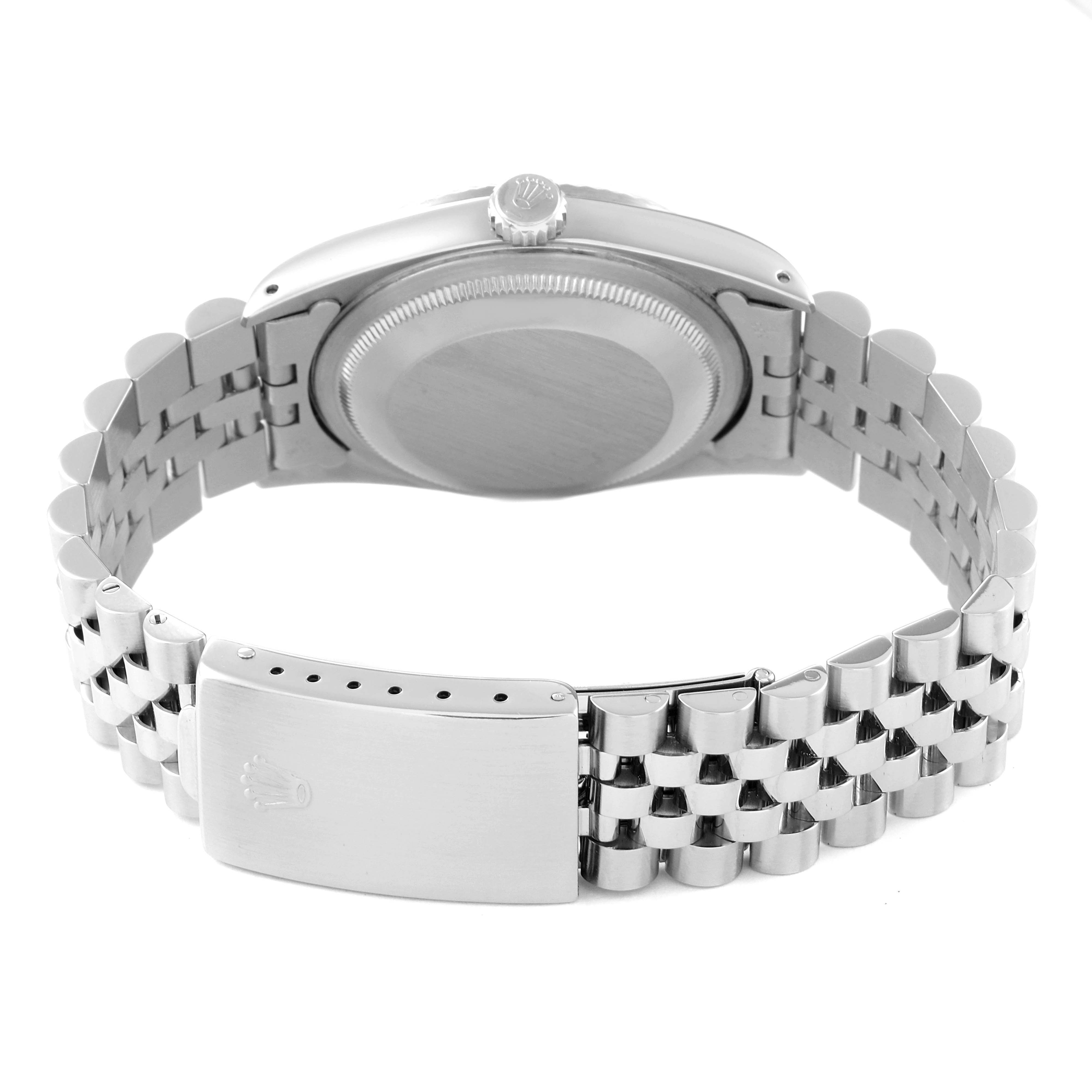 The image shows the back view of a Rolex Datejust 16234 Men's Stainless Steel Silver Dial 16234 Men's Stainless Steel Silver Dial watch, highlighting the case back, crown, and Jubilee bracelet with the clasp.