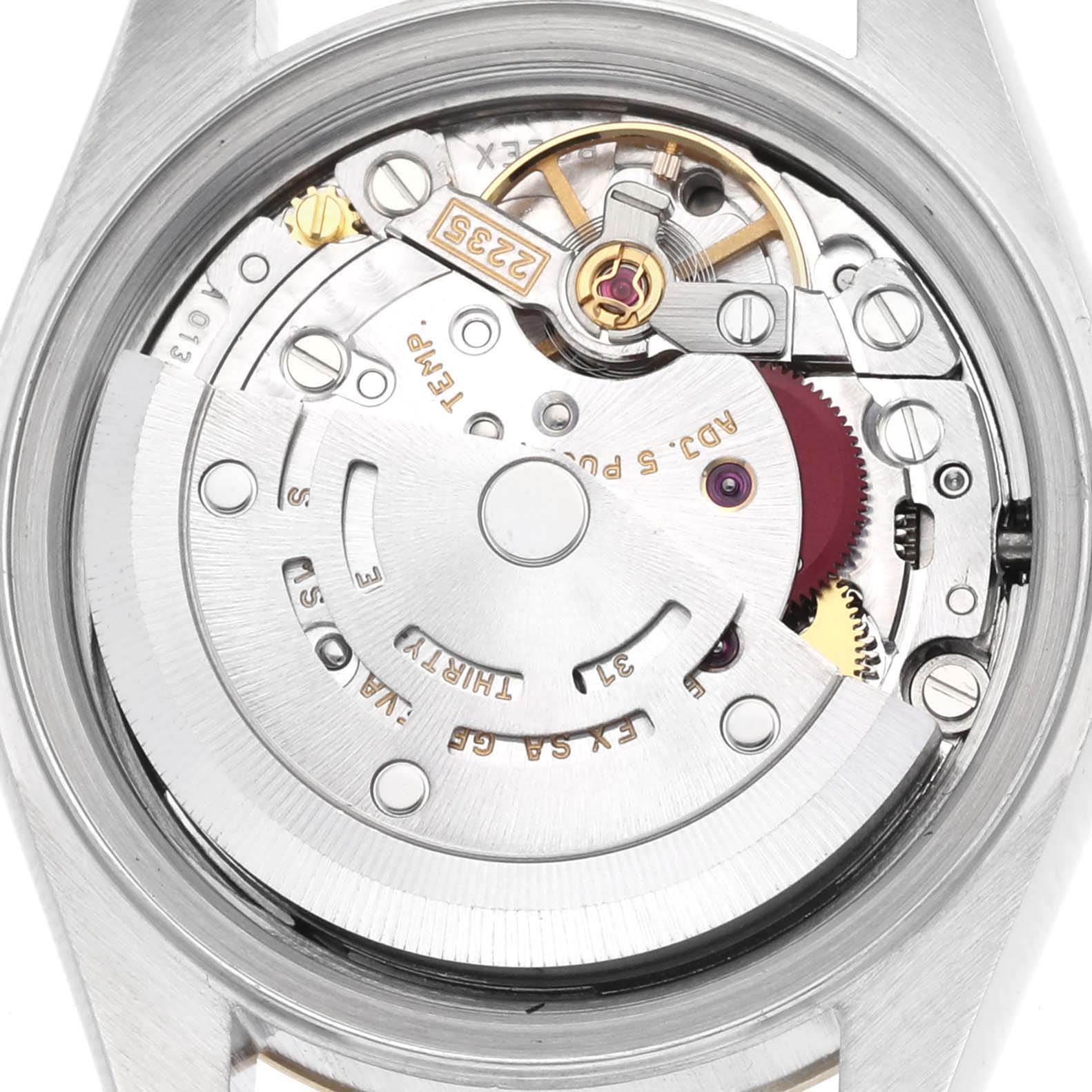 The image shows the movement of a Rolex Datejust 79173 Women's Steel and Gold (two tone) Champagne Dial 79173 Women's Steel and Gold (two tone) Champagne Dial watch from a back angle, highlighting its intricate mechanical components.