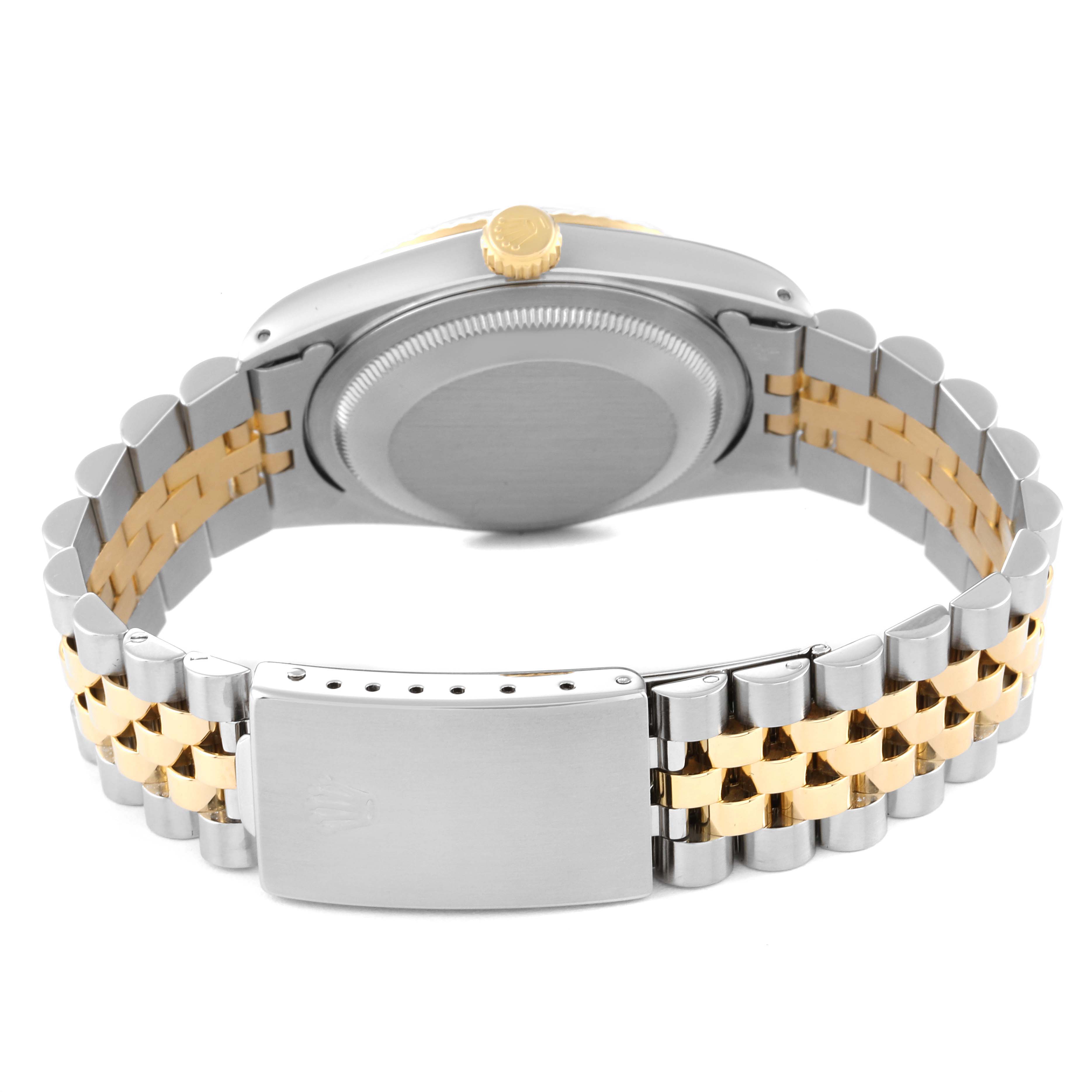 The image shows the back of a Rolex Datejust 16233 Men's Steel and Gold (two tone) Champagne Dial 16233 Men's Steel and Gold (two tone) Champagne Dial watch, focusing primarily on its two-tone bracelet and clasp.