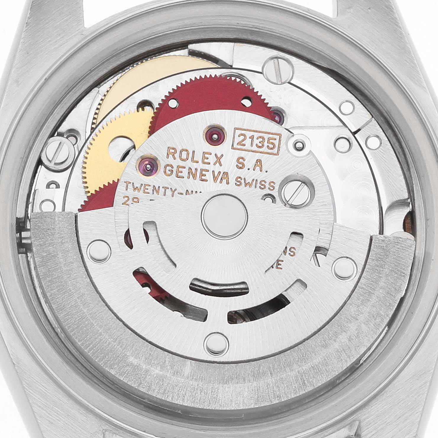 The image shows the back view of a Rolex Datejust 69173 Women
s Steel and Gold (two tone) Champagne Dial, highlighting its internal movement and mechanisms.