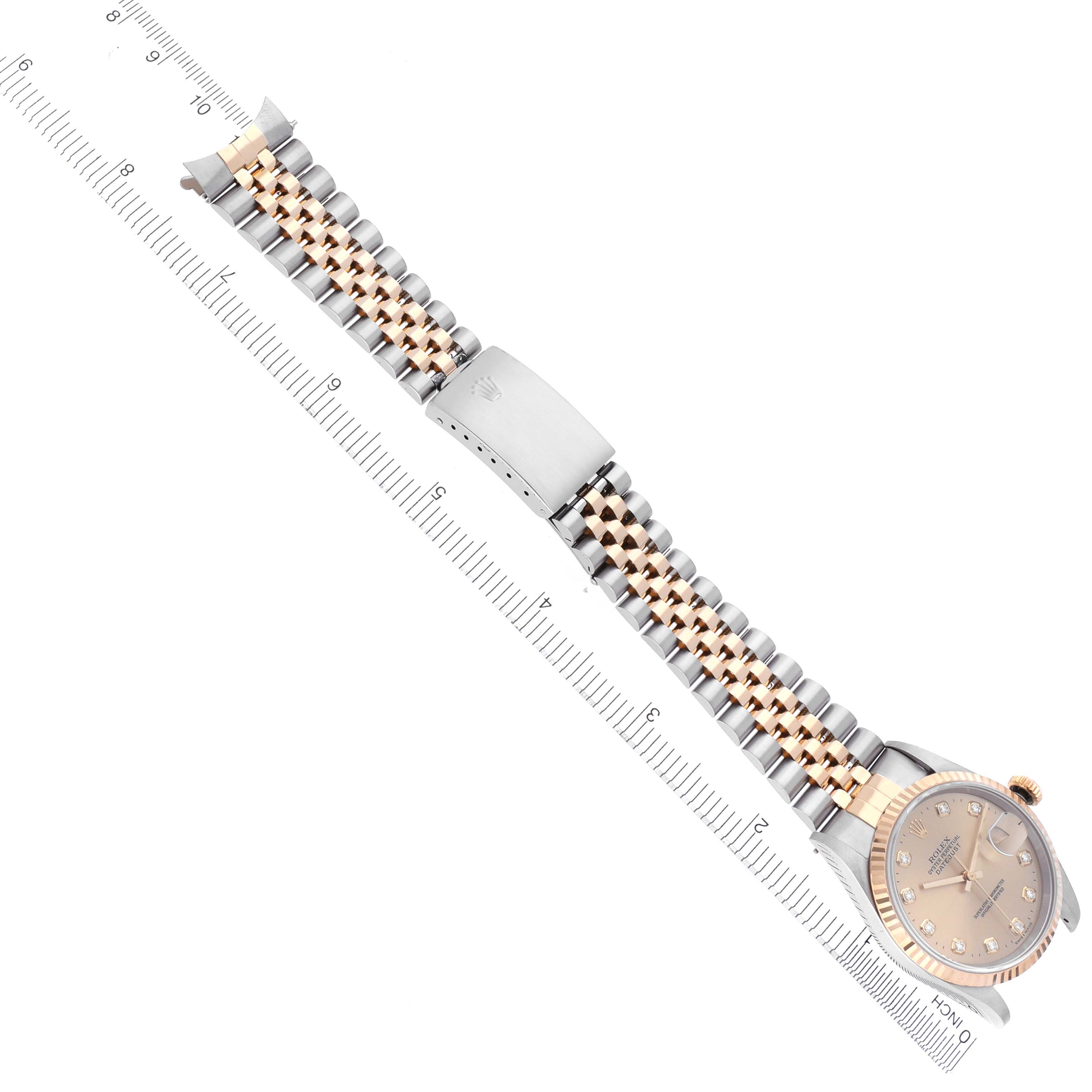 The image shows a Rolex Datejust 16233 Men's Steel and Gold (two tone) Champagne Dial 16233 Men's Steel and Gold (two tone) Champagne Dial watch from a top-down angle, highlighting the bracelet and bezel.