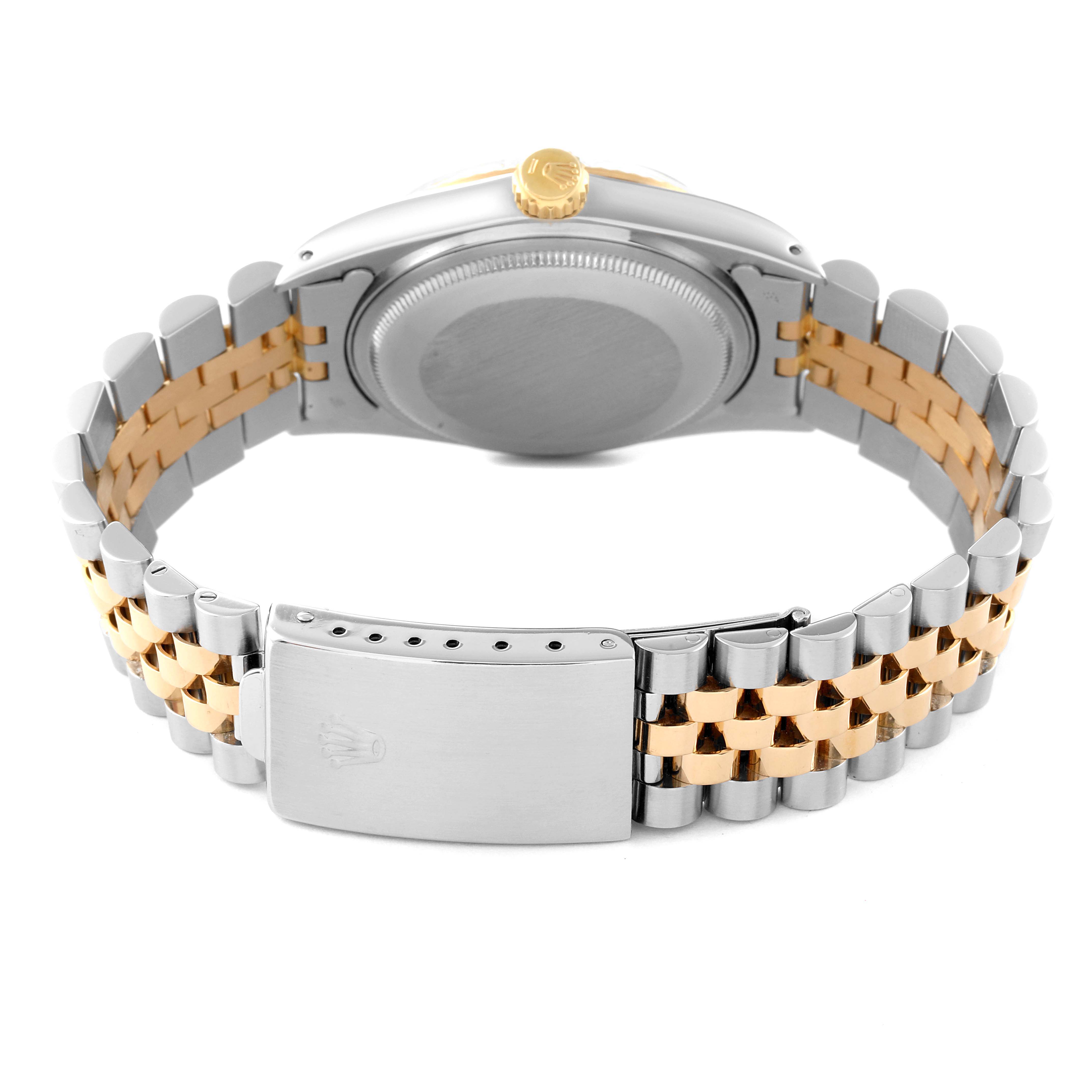 The image shows the back view of a Rolex Vintage Collection 16013 Men's Steel and Gold (two tone) White Dial 16013 Men's Steel and Gold (two tone) White Dial watch, highlighting its two-tone bracelet and closed clasp.