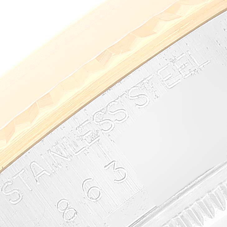 The image shows a close-up of the bezel and part of the casing with engravings on a Rolex Vintage Collection 16013 Men's Steel and Gold (two tone) White Dial 16013 Men's Steel and Gold (two tone) White Dial watch.