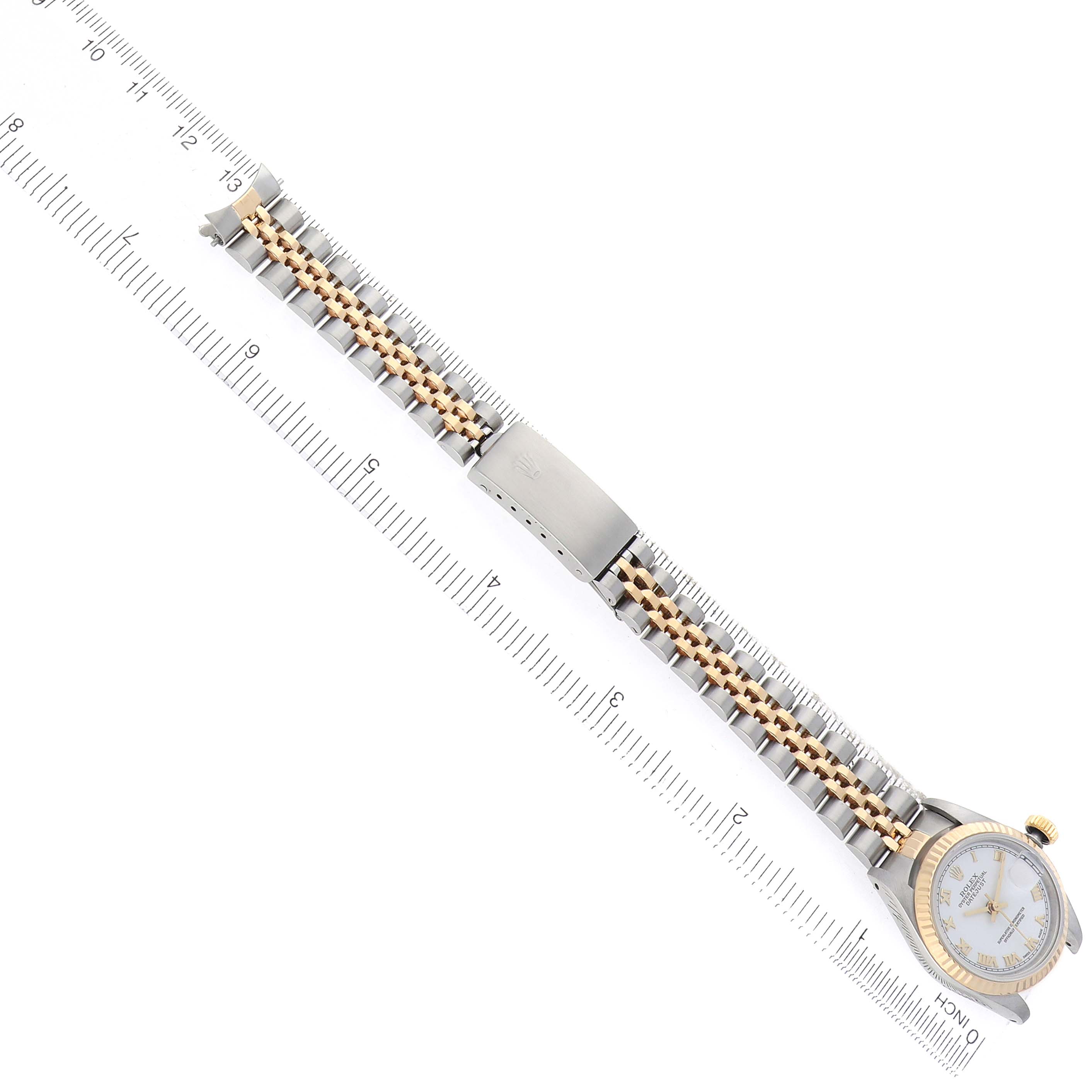 The Rolex Datejust 69173 Women
s Steel and Gold (two tone) White Dial is shown from an overhead angle, featuring the full bracelet and part of the watch face.