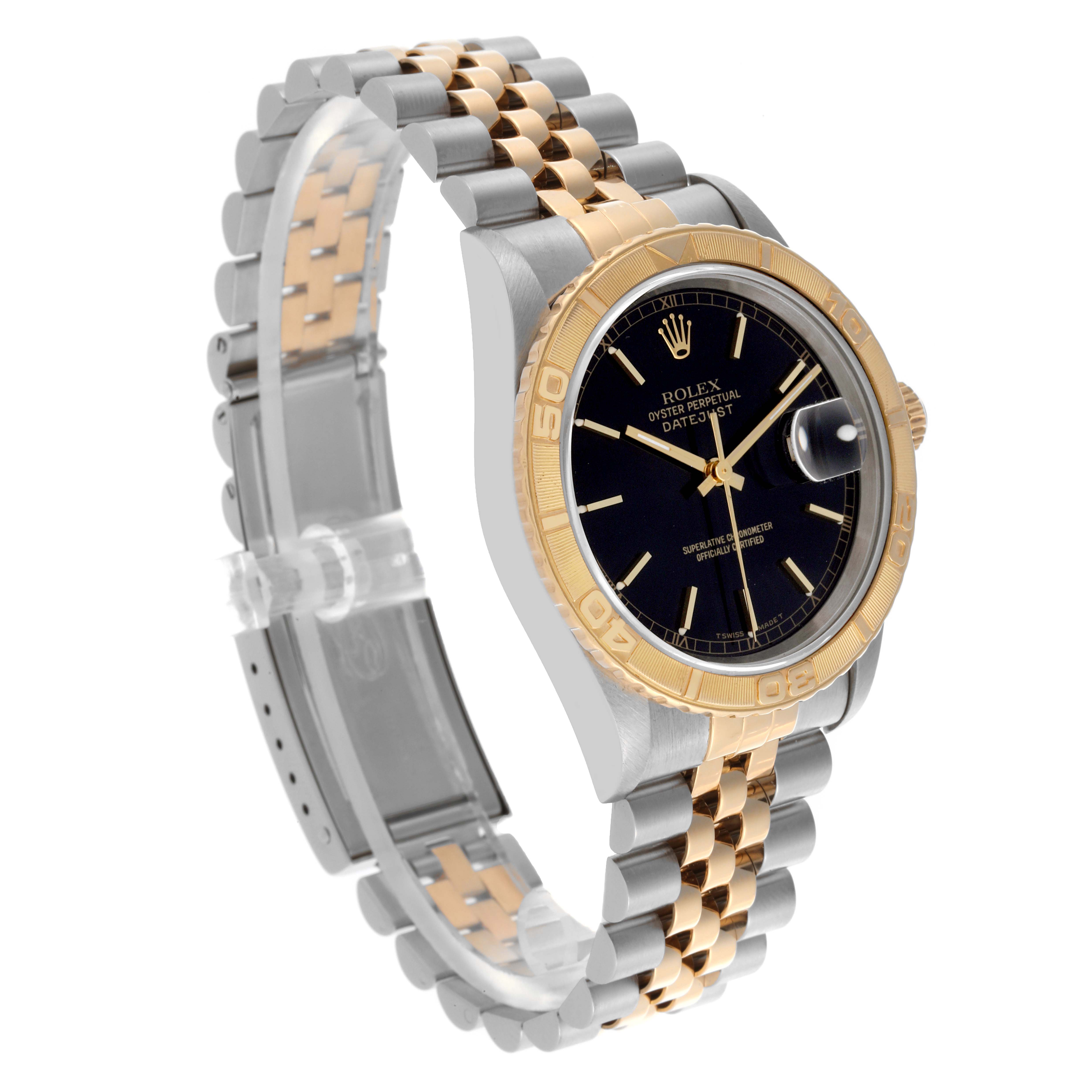 The Rolex Turn-o-Graph 16263 Men
s Steel and Gold (two tone) Black Dial 16263 Men
s Steel and Gold (two tone) Black Dial watch is angled to show the face, gold bezel, and two-tone bracelet.